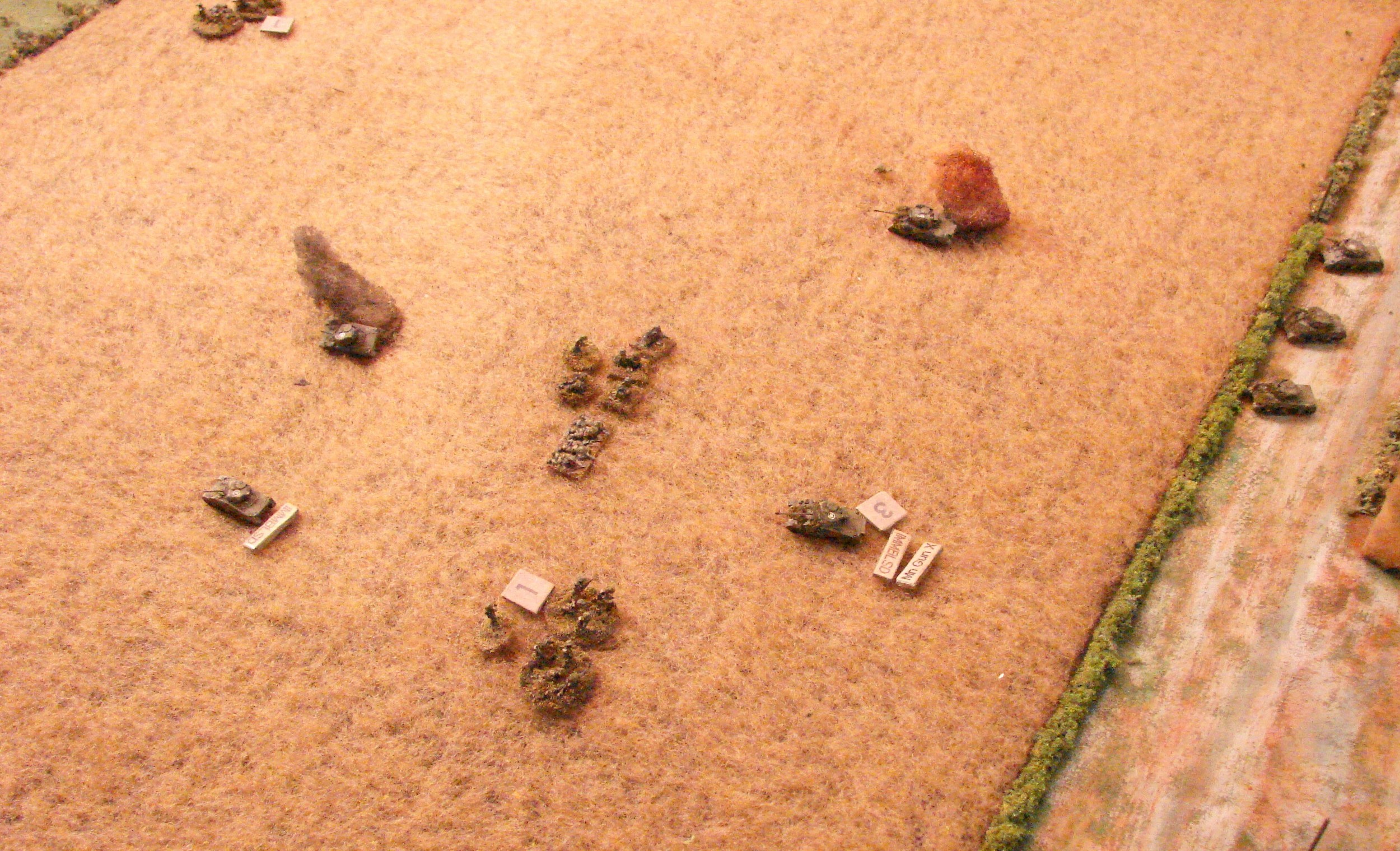 Pulling back The HQ sqd and supporting 2" mortars pull back up the hill. It looks like the 2nd troop might be going in to pull out the remaining Seaforths
