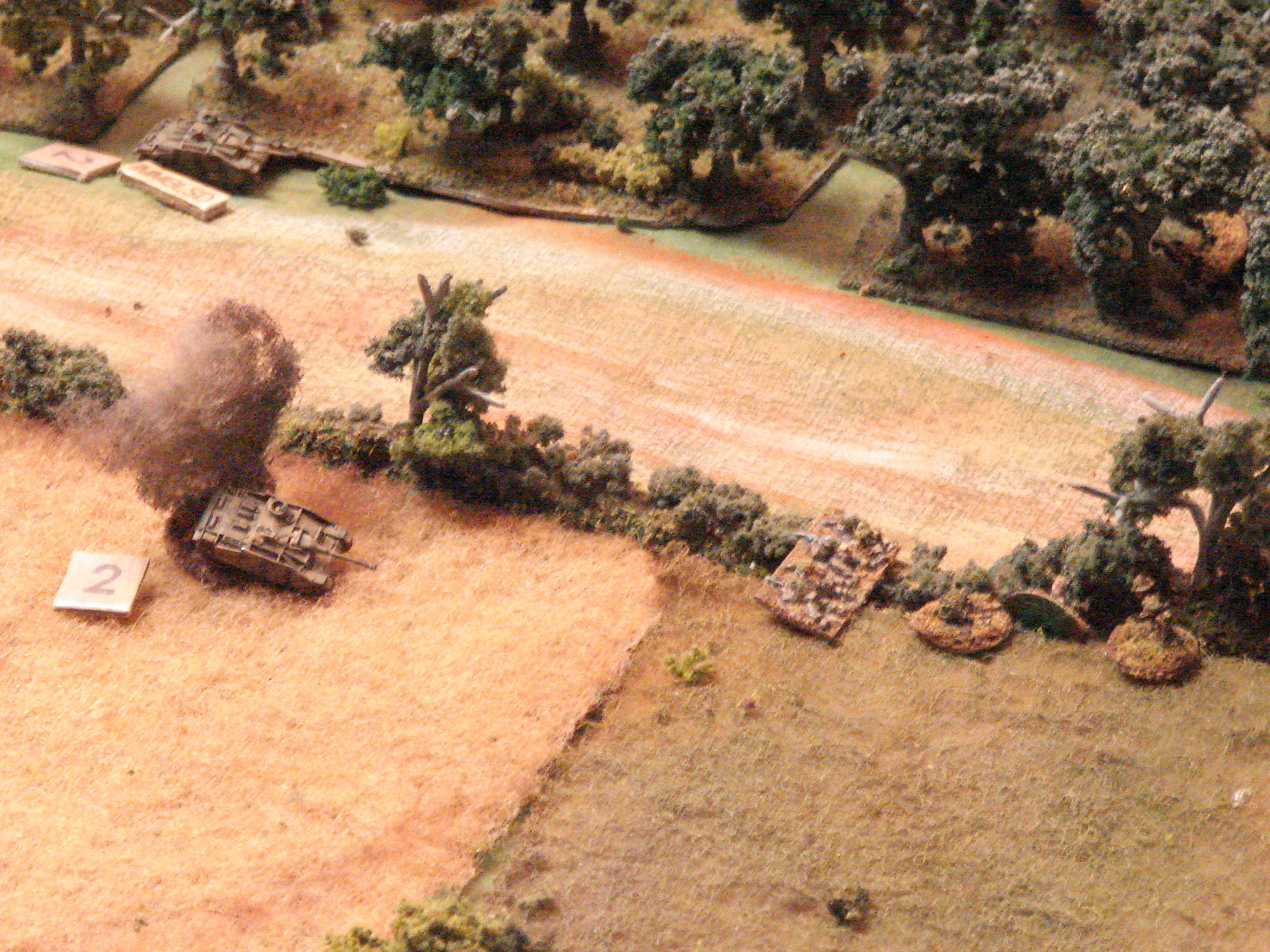 PIATs score The British infantry dash across the road after eliminating the defending grenadiers and smacks the StuG with a PIAT. Another StuG lies abandoned along the orchard.