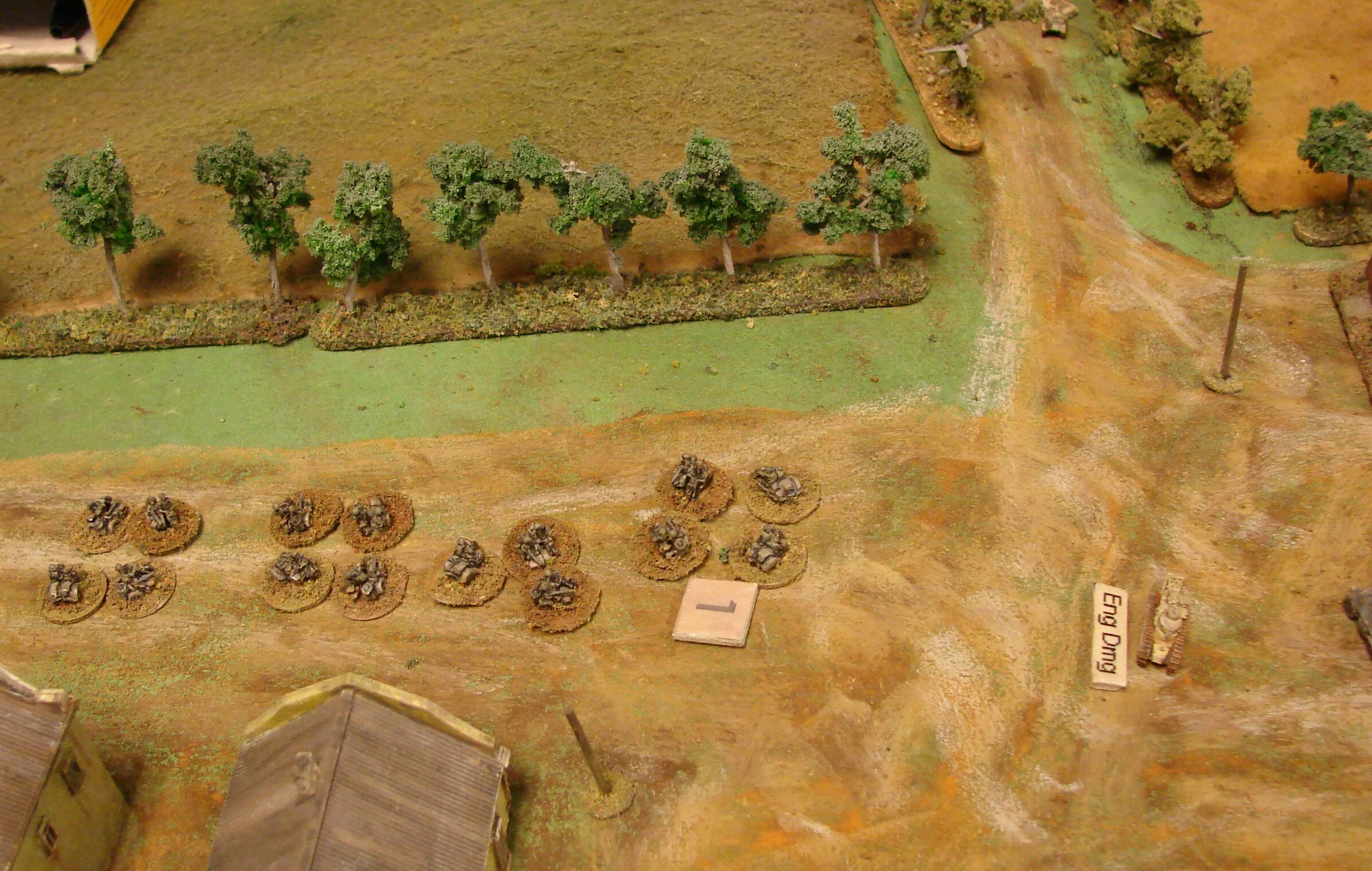 German motorcycles The next unit on for the Germans was a platoon of motorcycle troops. They immediately run into the broken down FT-17 who puts a couple of 37mm shells into their column. The FT-17 finally failed its engine damage roll. The m/c are from GHQ and too small for the German player to figure out which direction is their front!
