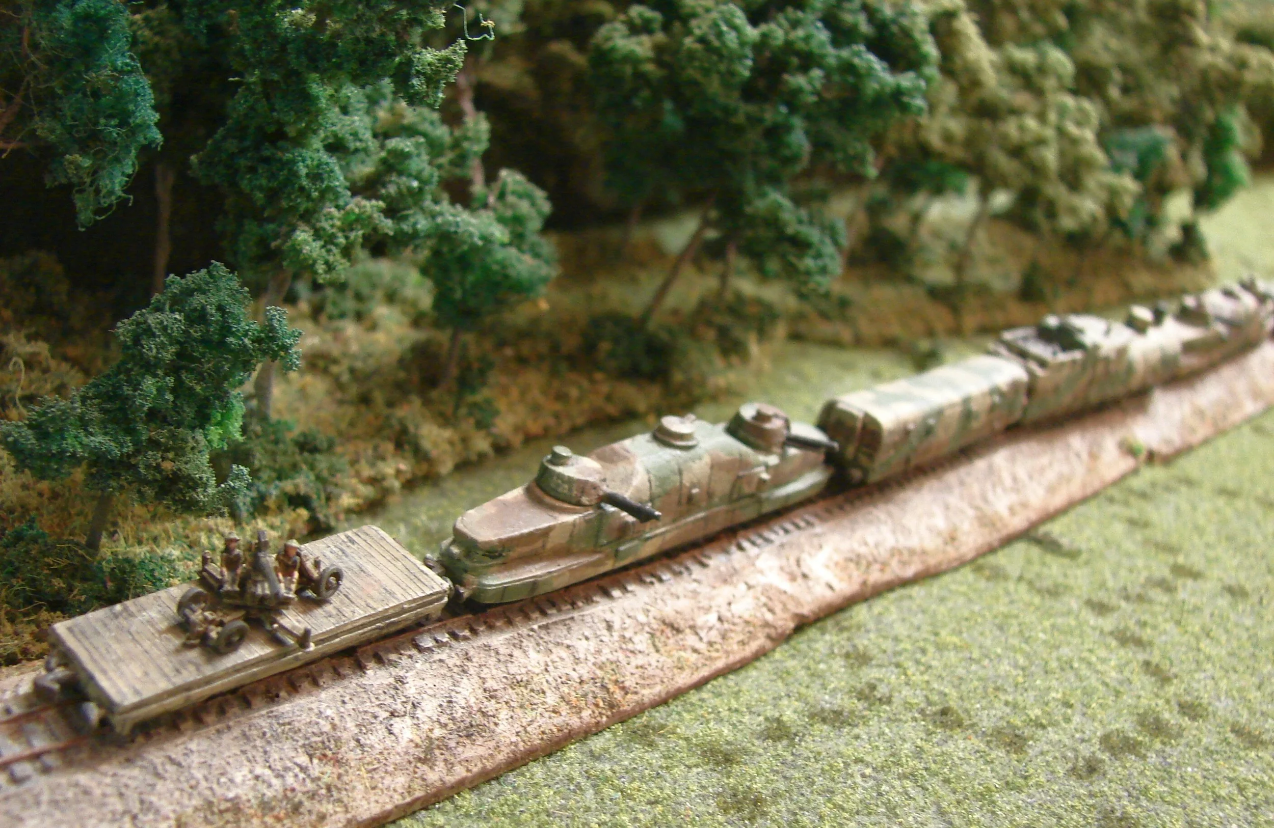 The train again The Bofors AA was placed on one of the flat cars that was the front and back of the train. They were very fortunate to 'find' this piece to supplement their megre AA defences.