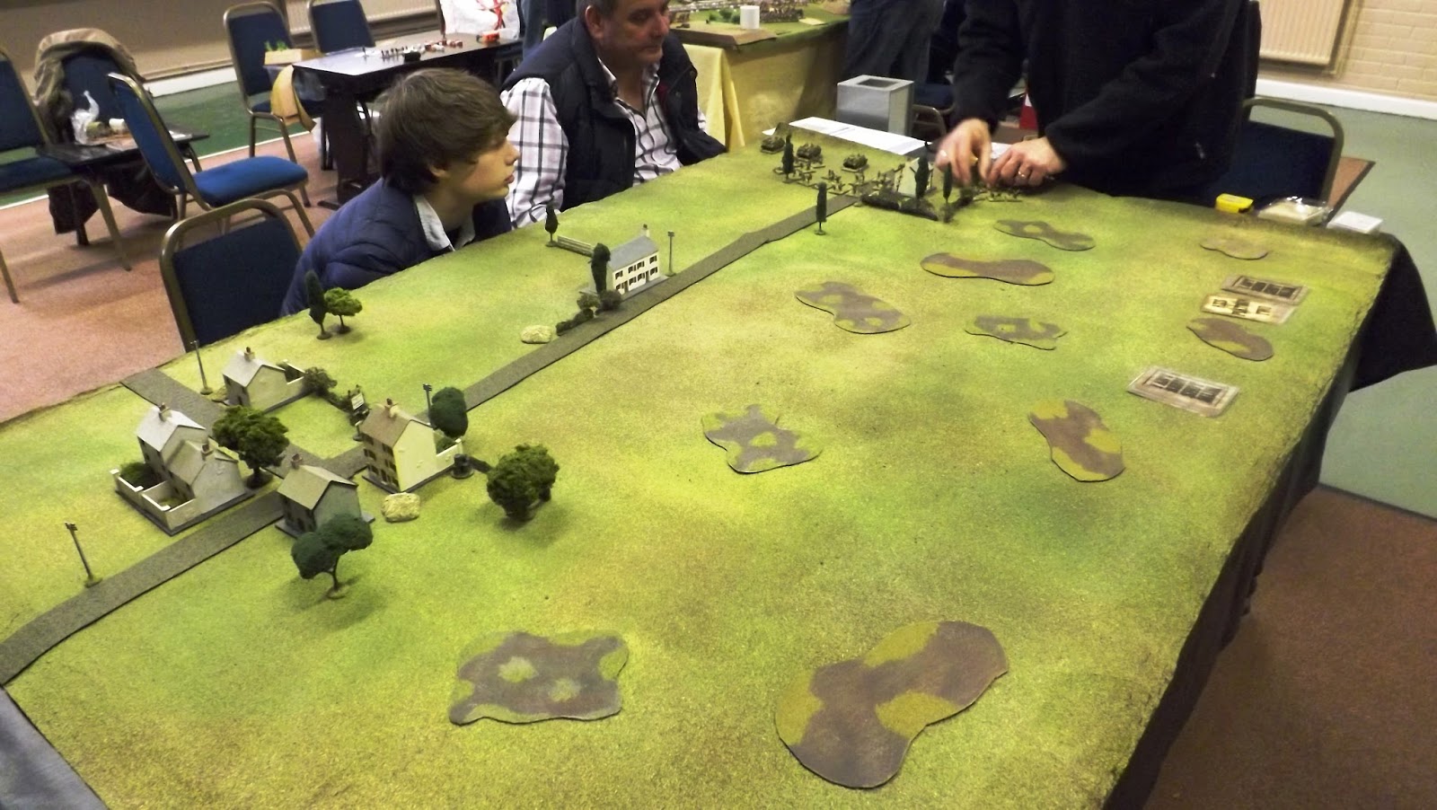Young Charlie commanded the British airborne troops, watches closely as the Germans start to deploy on their end of the Benedendorpsweg