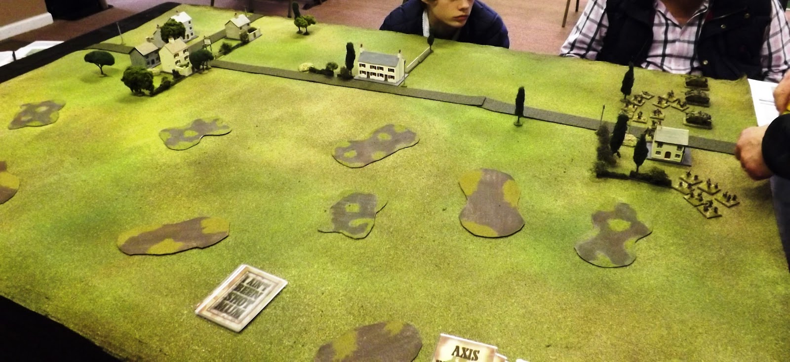 The table this side of the road borders the river bank and is difficult going for vehicles and foot troops. The IABSM card deck is assembled and ready to go with the first German units moving on to the table.