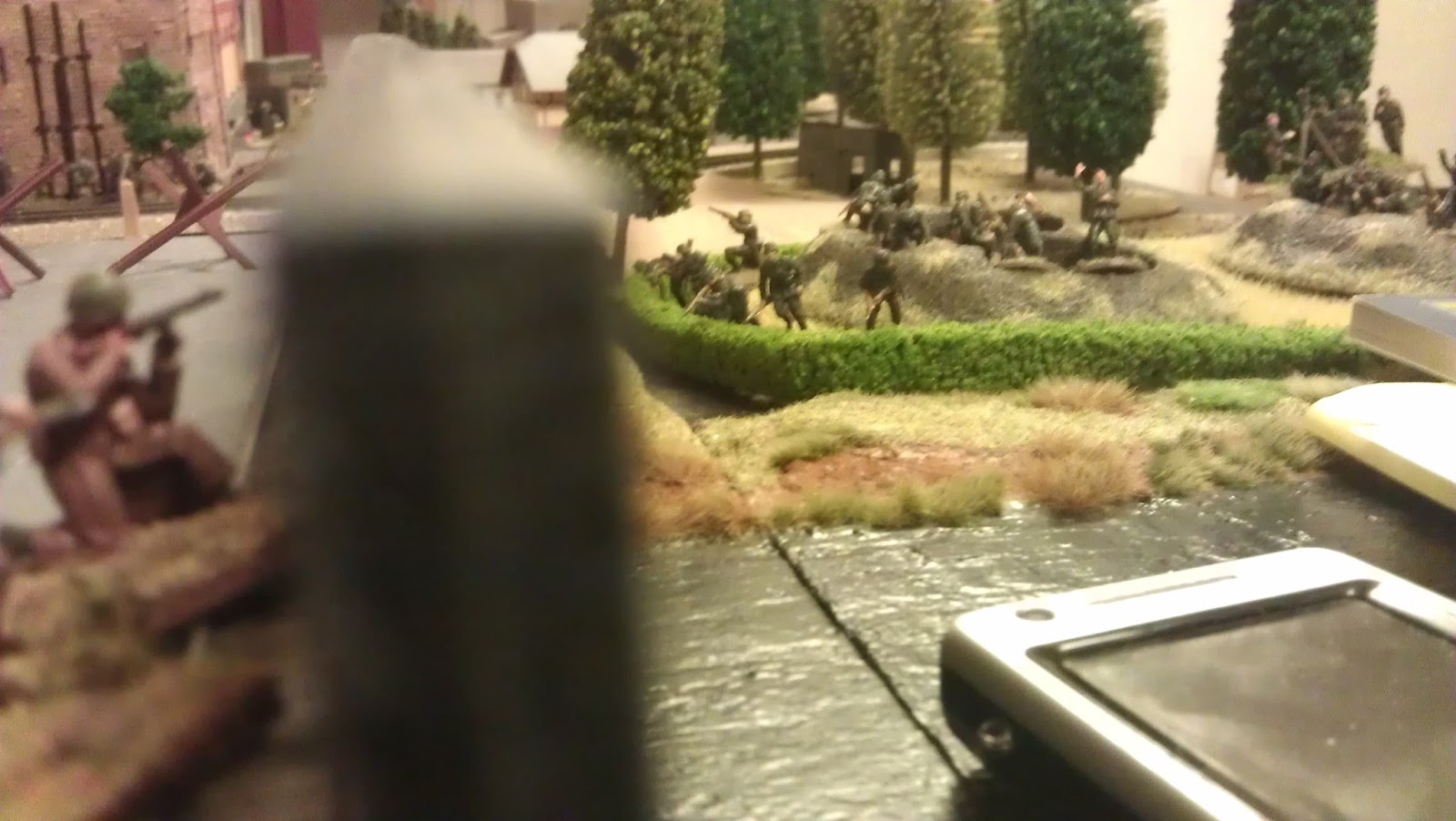 Out of ammo, the mortar crew picks up their rifles.