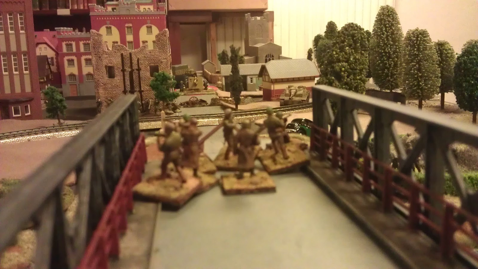 One squad vs an 88, a StuG, a Stummel and assorted infantry.