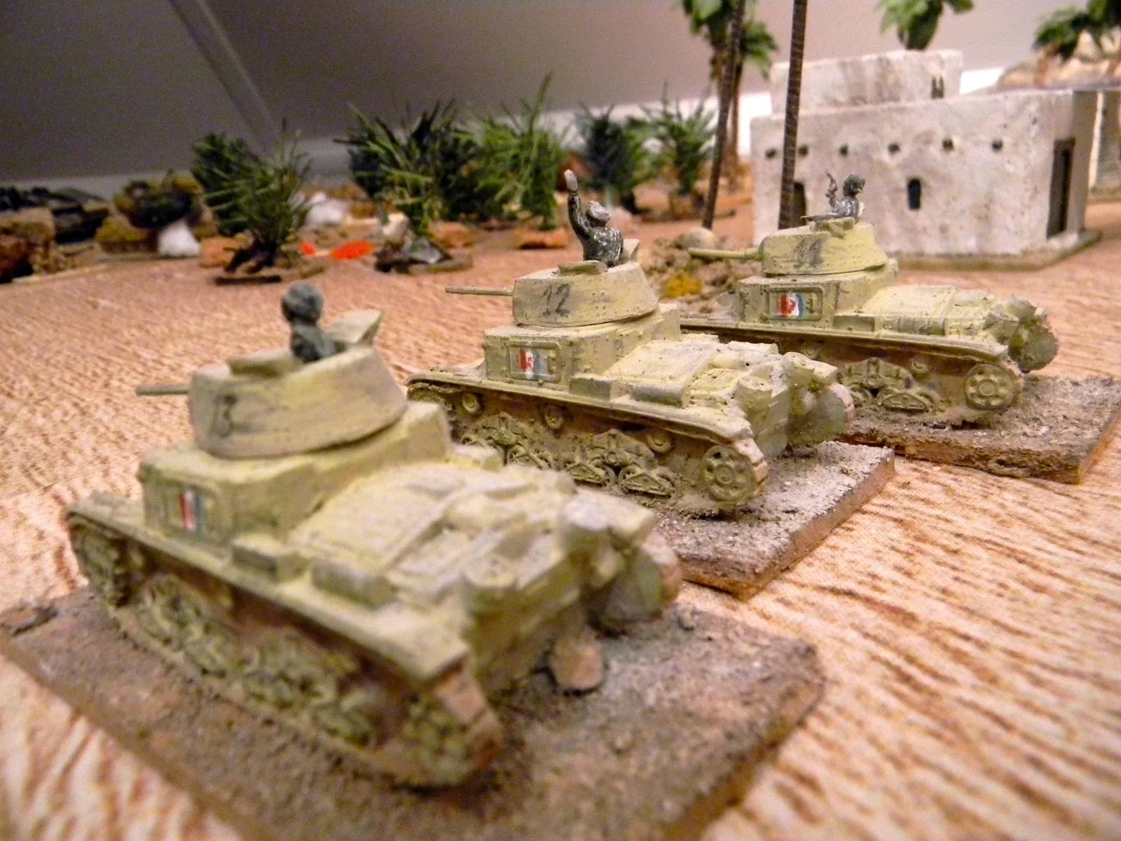   Not wishing to miss out, an Italian tank troop emerges from cover to engage the Honeys  