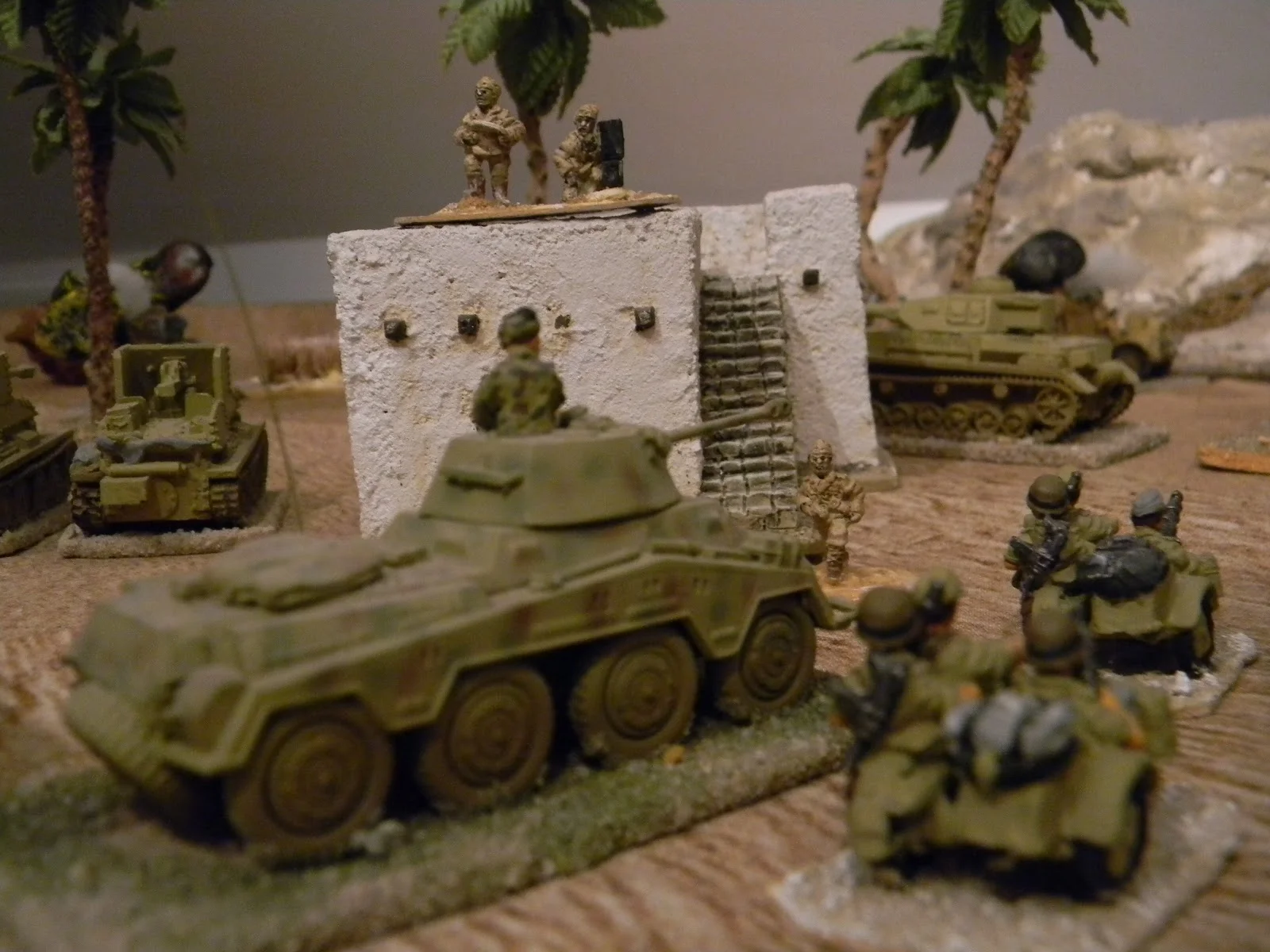      The Italian commander emerges from his HQ building to thank the German CO.  