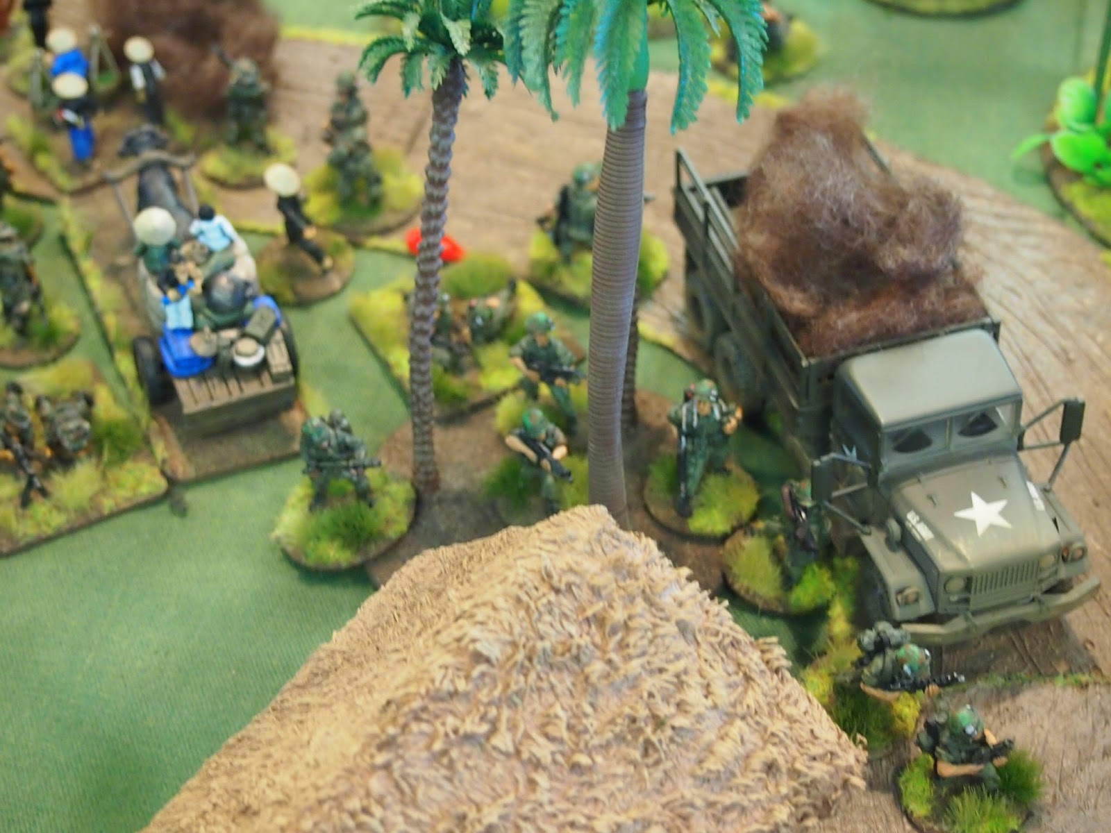 Platoon one section three finally making its way into the village with flamethrower support