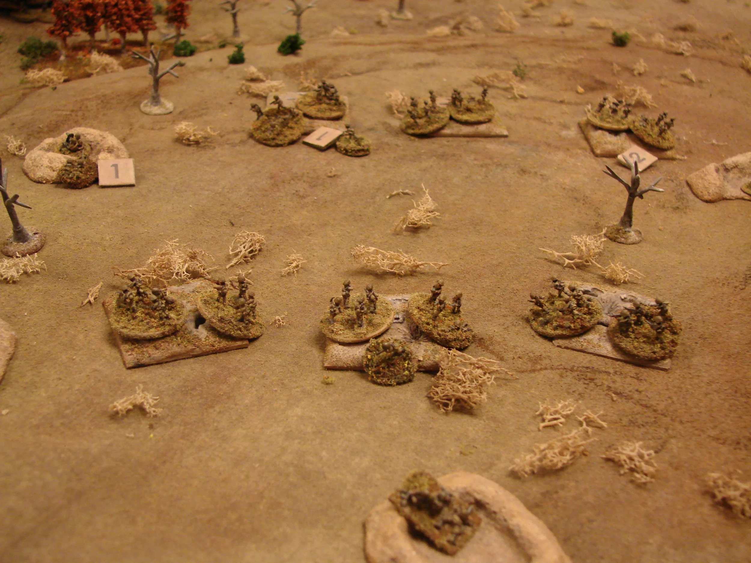 NKVD troops under fire Although dug in, the combined fire from 13 panzer MGs and the pioneers puts some hits on the Border Guards. Their ATRs are ineffective against the Panzers and few of their shots are finding the Pioneers in the trees.