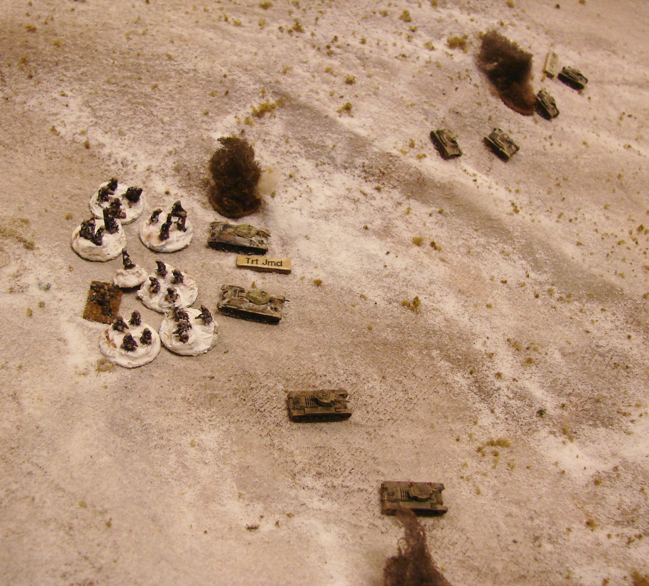 More hits on the 136th The PaKs managed to destroy another T60 and jam a T34 turret. The Infantry gun and MMGs were also knocking off the infantry. These Red infantry were considered poor quality since they were mostly rear area troops so they quickly ran out of activation dice.