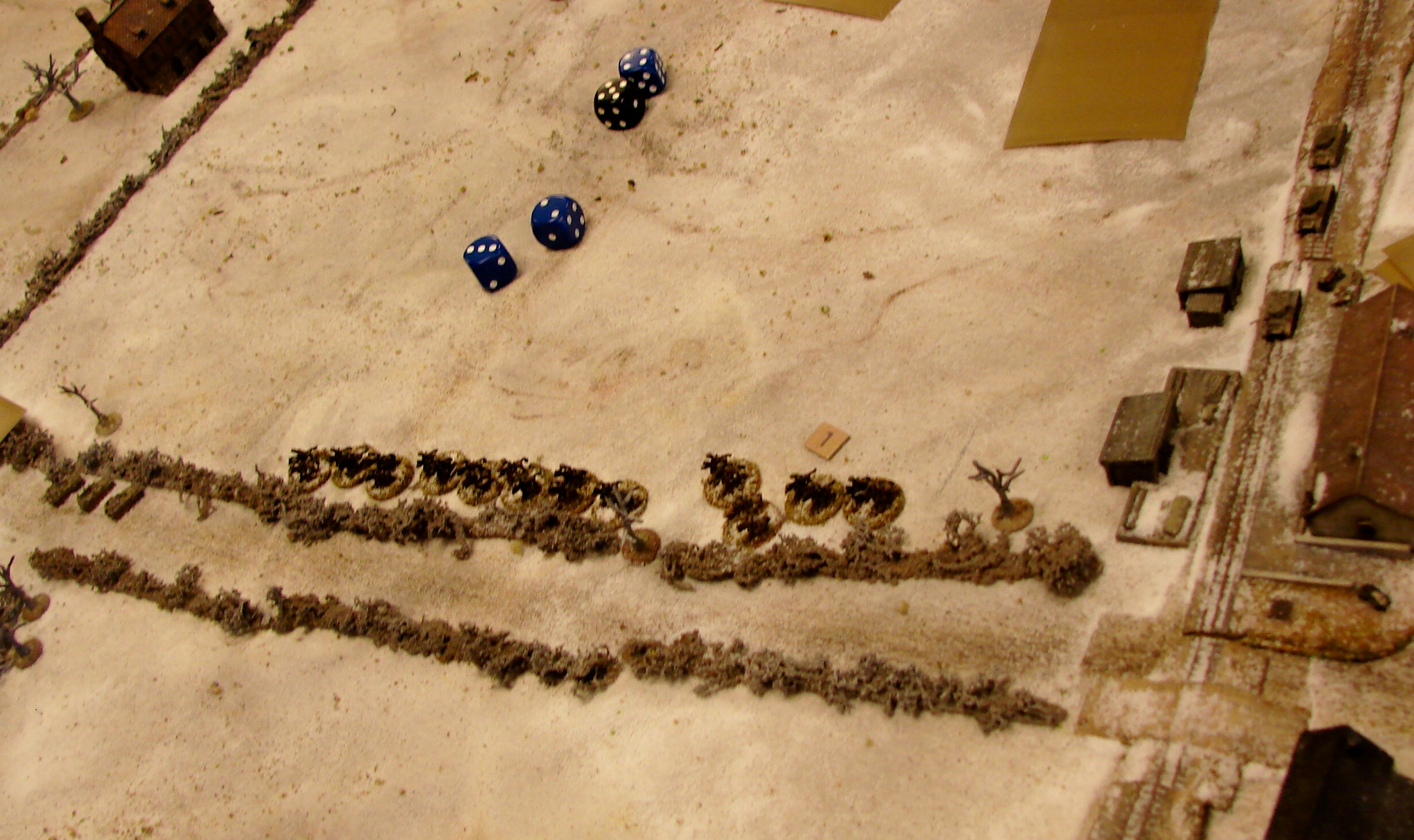Head to the trees Edward's horsemen head towards the road and get out of the halftracks' line of sight. MkVIIIs open fire on the Germans.