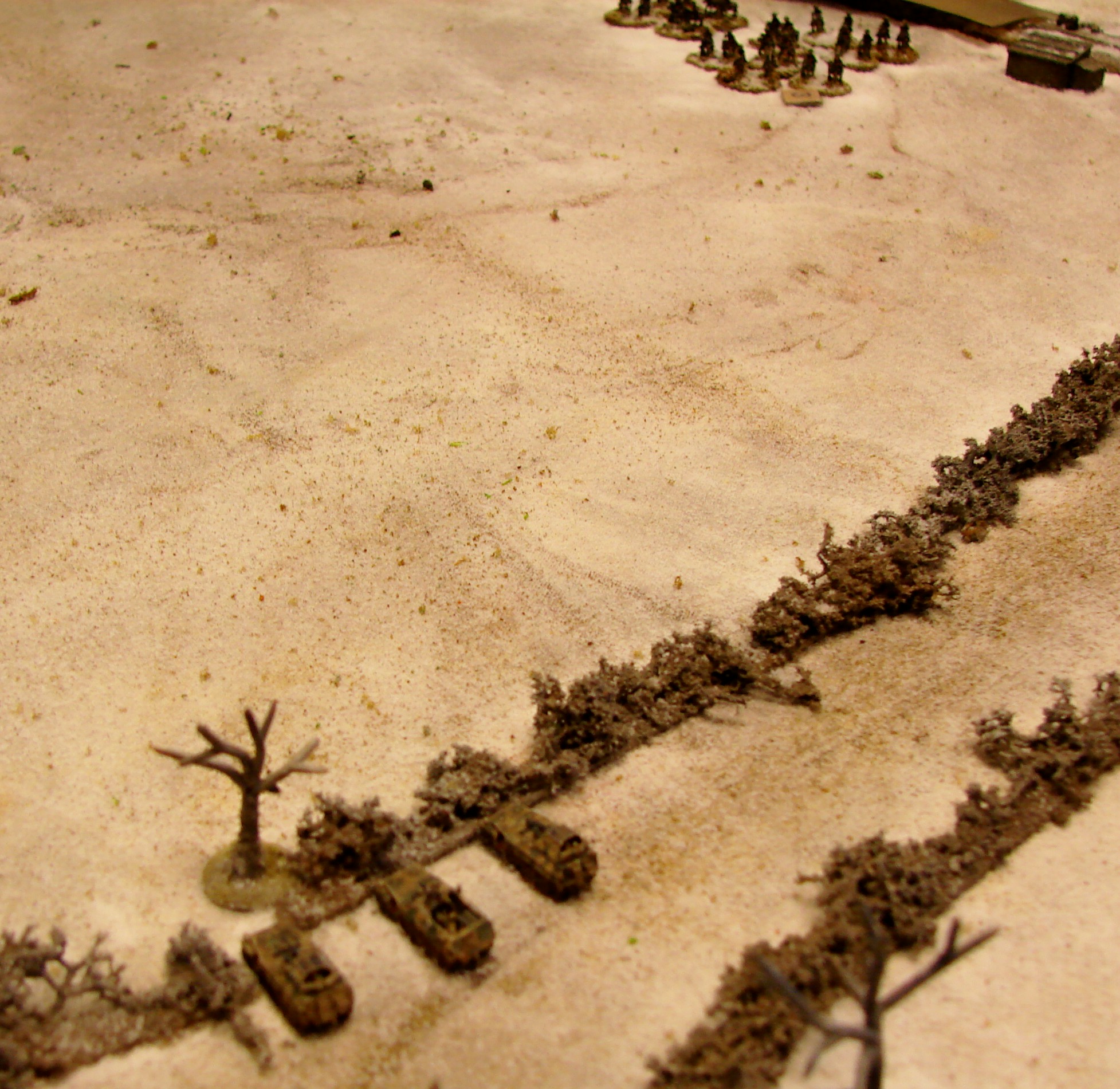 Covering the retreat Rob's 250s are the tailend charlies of the column. Tim got some great rolls and really put some ground between his foot troops and the advancing Russkies. Soviets also missed a couple of turns of movement to begin the game.