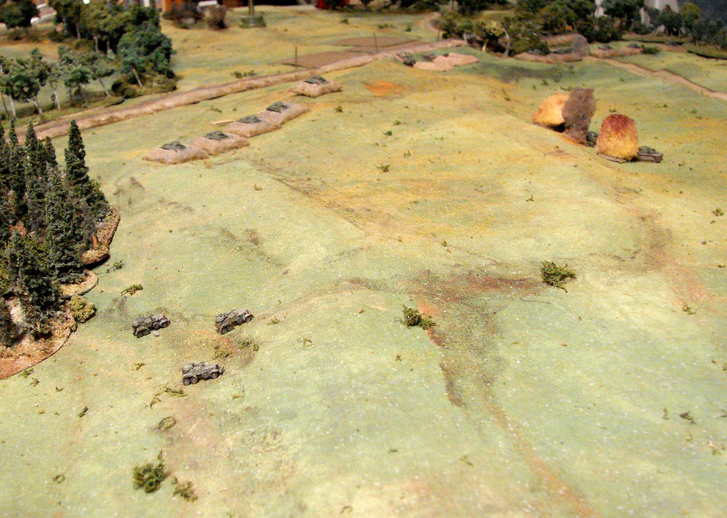 BA10 emerge I moved my unit of BA10s out to keep the Germans from flanking the T34s. The pine woods would be impassable in this game.