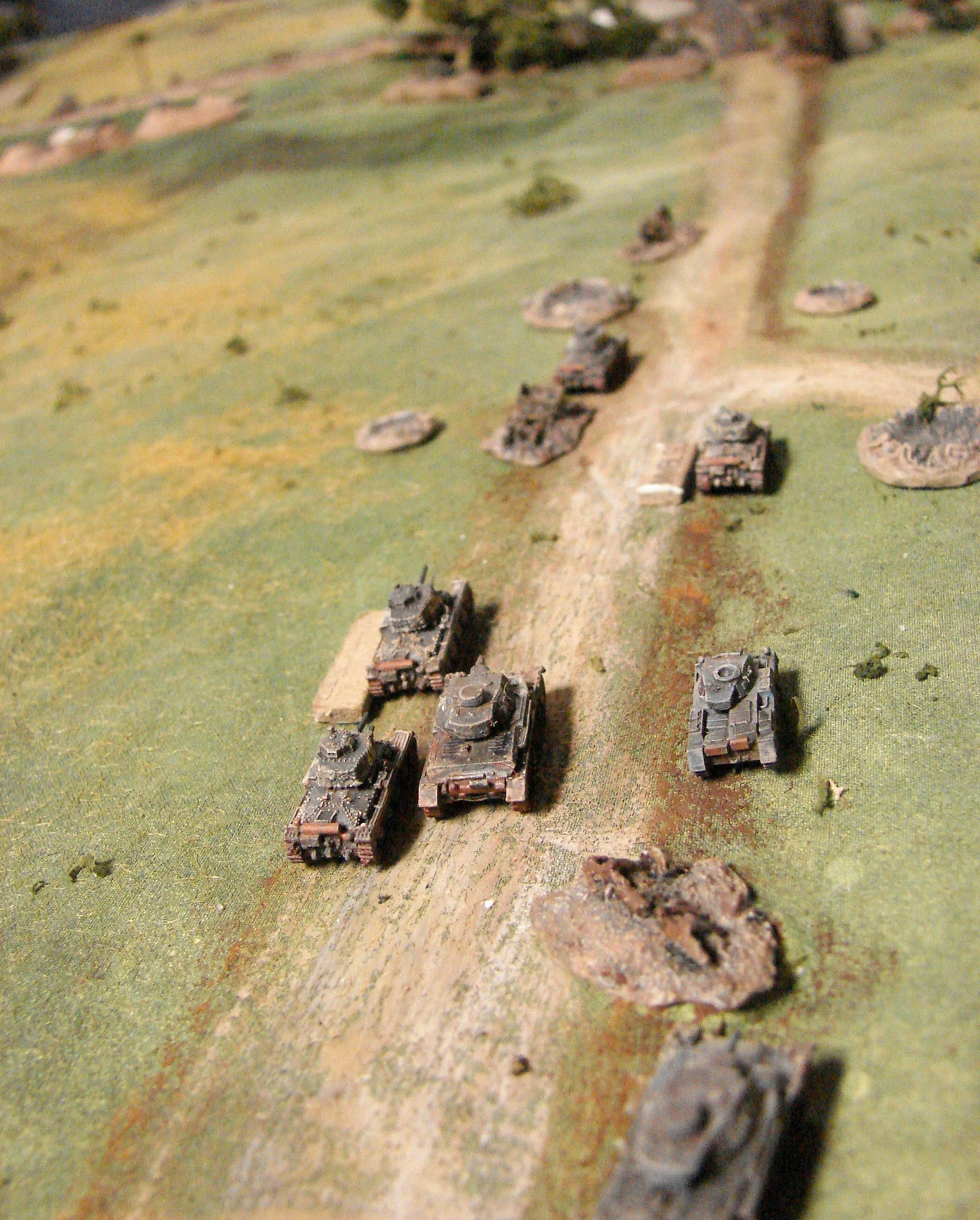 Advancing panzers A couple of the panzers have taken some damage, but the exchange with the dug in T34s is definitely going to the Germans advantage.