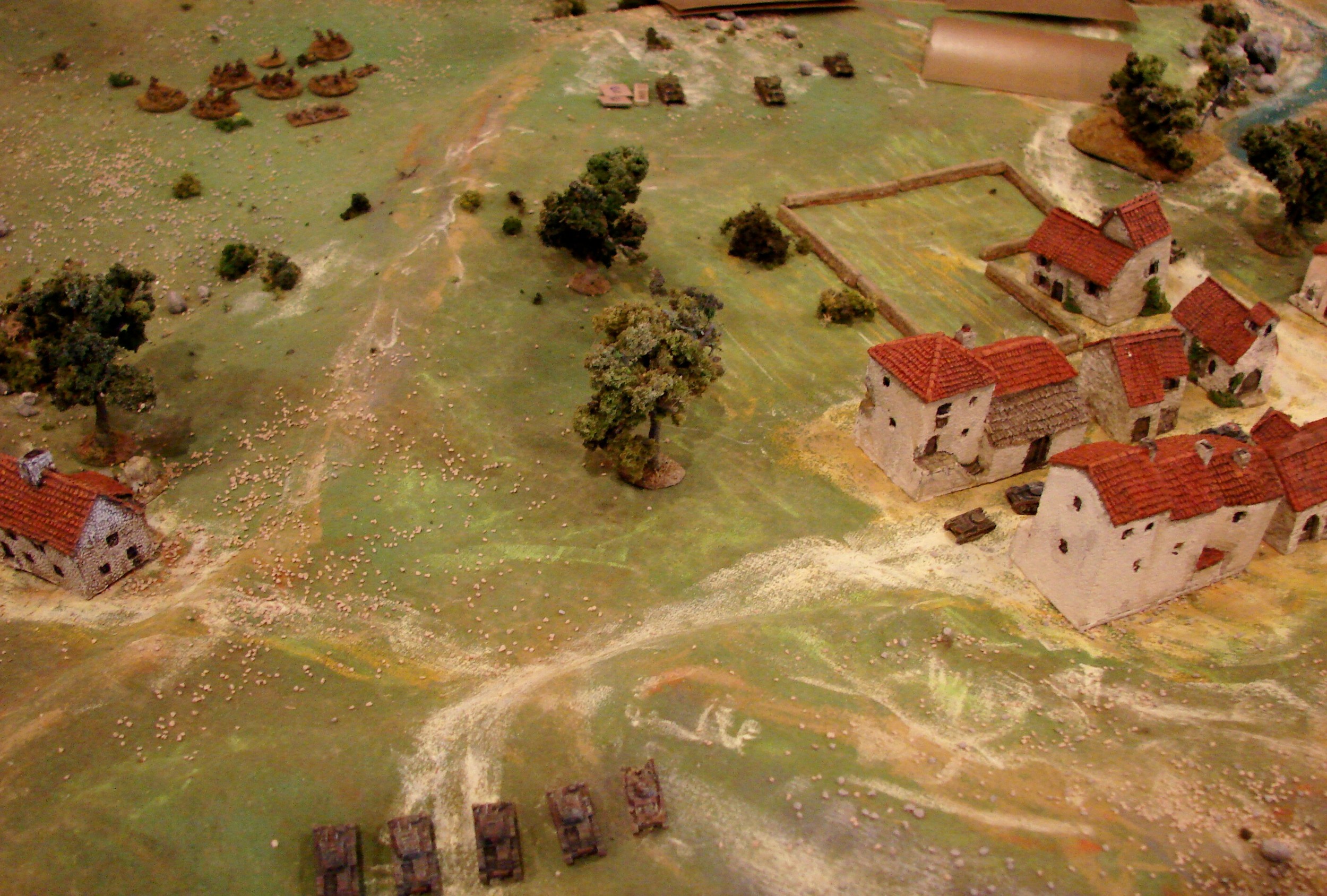 A10s and Light panzers trading shots The first fire was between the A10 troop and Chris' Light tanks arrayed along a slight ridge. The panzers scored first and took one A10 out. The British commander: A10s proved to be more fragile than I'd hoped. Really got bogged down once they were off the road and the bloody huns managed some damnably good shooting. I say that grudgingly, of course.