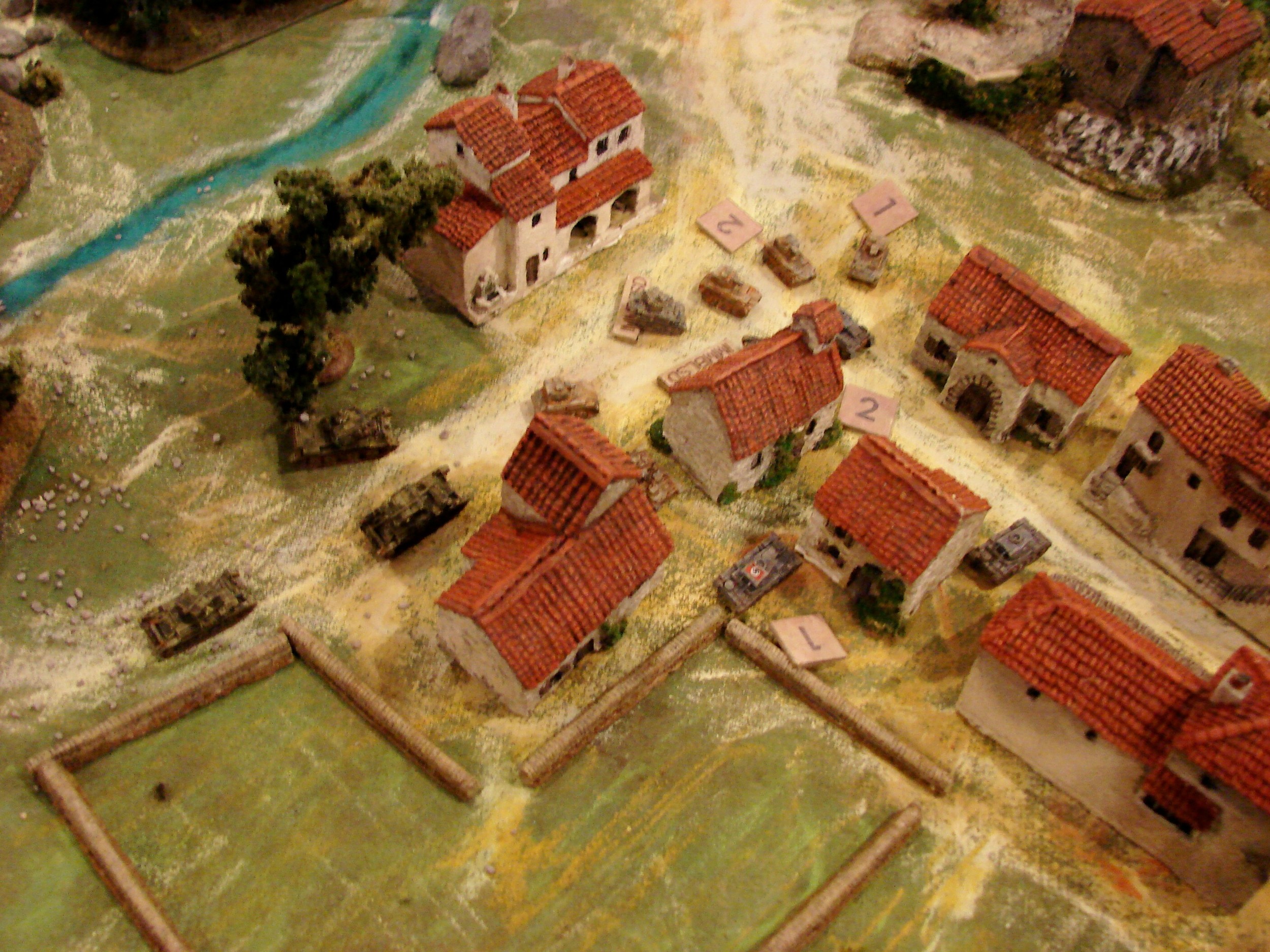 Clash of the Titans on a low budget The MkVIs do a fair job of chewing up the Pz Is and IIs: especially if they can hit the side armor, but they also receive damage. The HQ troop moves up also.