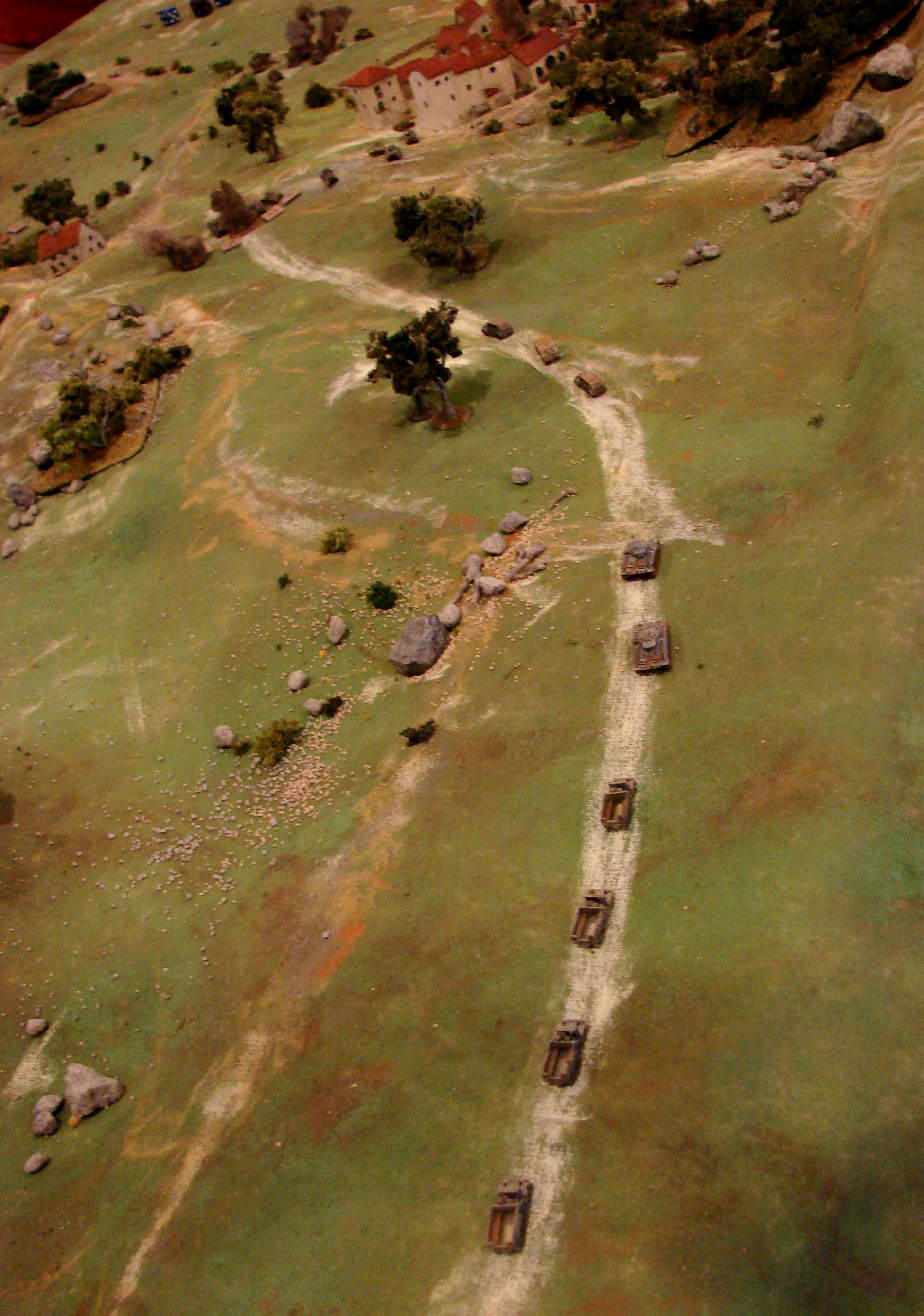 More Germans More grenadiers arrive on the table. The Grenadier HQ section is in the lead followed by two Pz IIIs. Another platoon of Pz IIIs has moved well off to the left in the center of the table. The British commander: Seeing these guys come off their blinds, I knew defeat was just a matter of time.