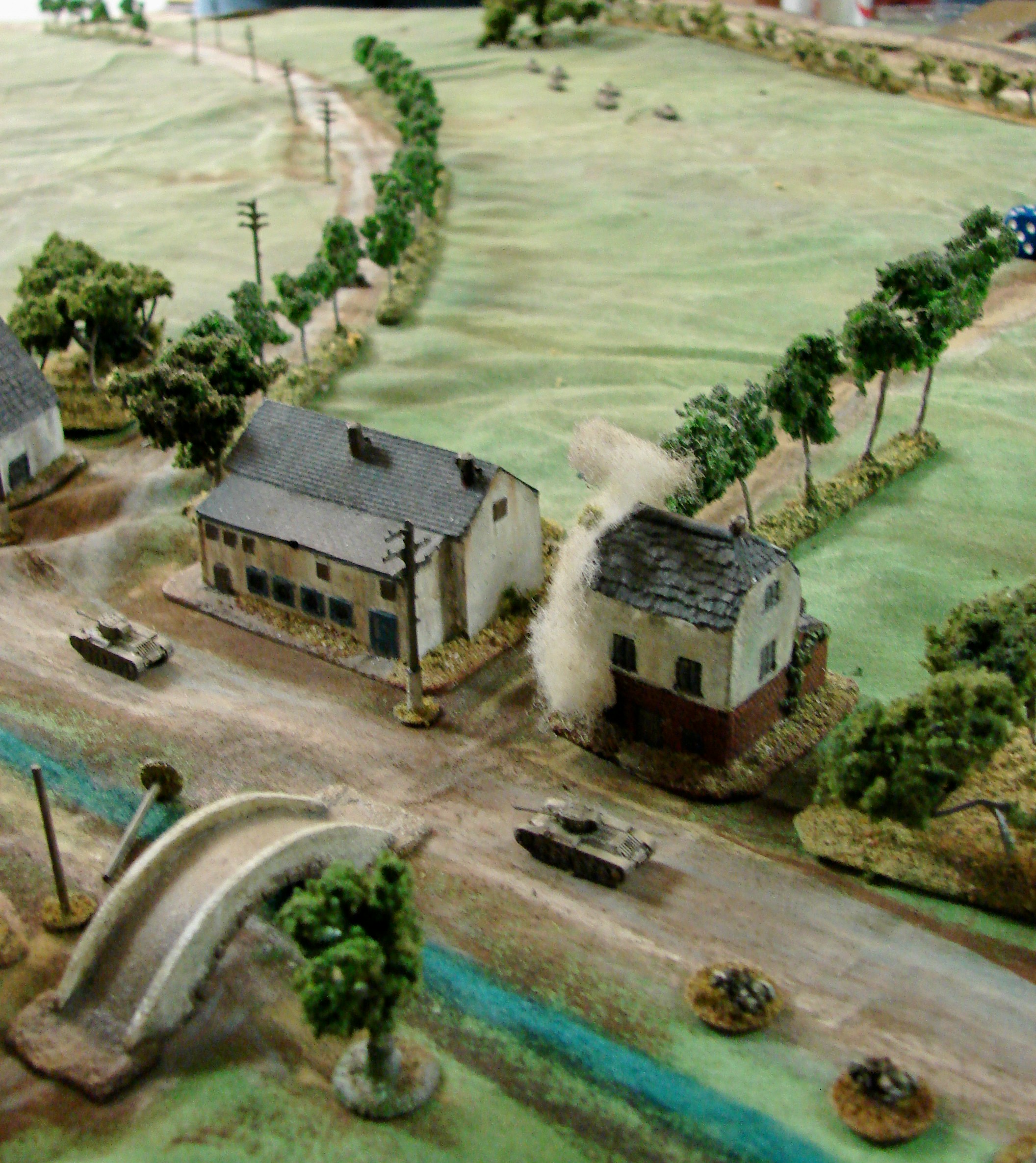 View to the right As the Valentines move up to engage the Pak and MMG, Brian's SS recce units are coming into view on the far right.