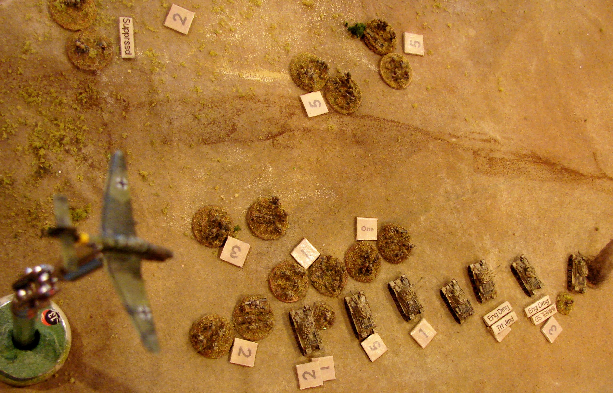 Saviour from the air But luck was with the Germans. Not only did the German airstrike card come up but it arrived before the Russians could exploit their advantage and run over the grenadiers. This strike took out just about all the Soviets. I have to say that this was the most effective bomb run I have ever witnessed. On target-which meant that it hit every Red unit in that group and missed the Germans. The Russian infantry lost men in all sections and only had one unit with any action dice after the attack. The T34s were played out completely due to shock points and hits.
