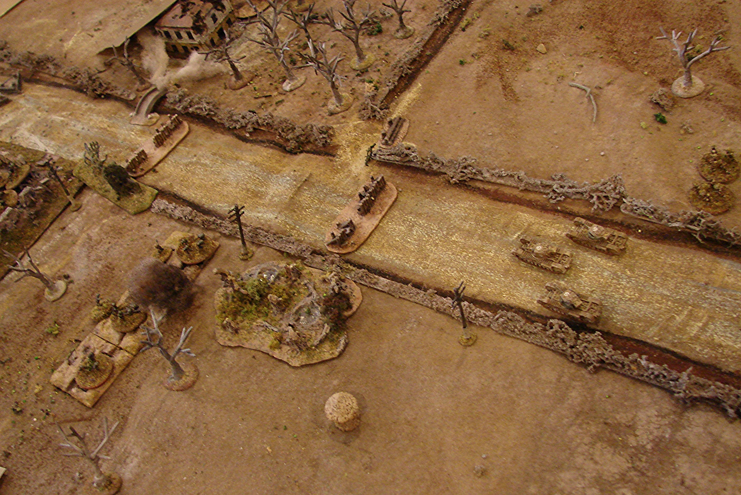 First real action Churchills fire at the dug in grenadiers to their left front who in turn open up on the infantry on the other side of the tanks.