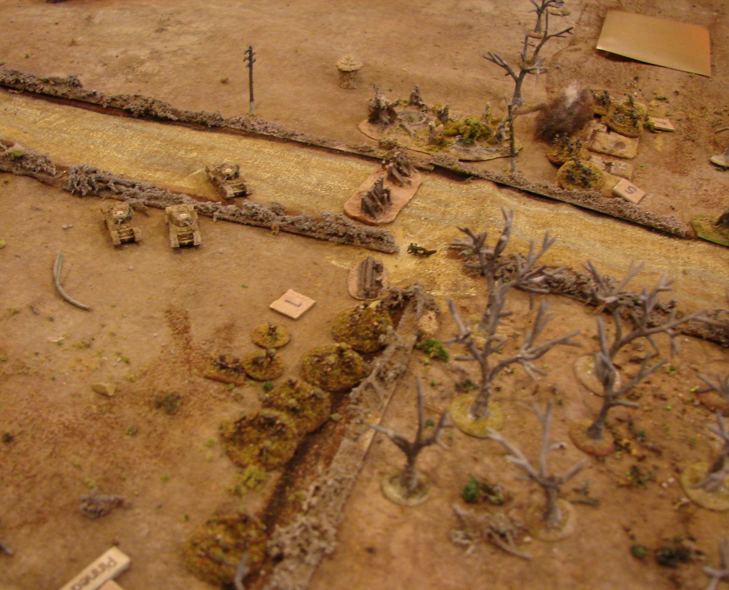Shift right Seeing no sense in getting any closer to some undoubtably Panzerfaust-armed Germans, the Churchill troop moves off to their right. Meanwhile, the first platoon is still under fire in the ditch behind a hedge.