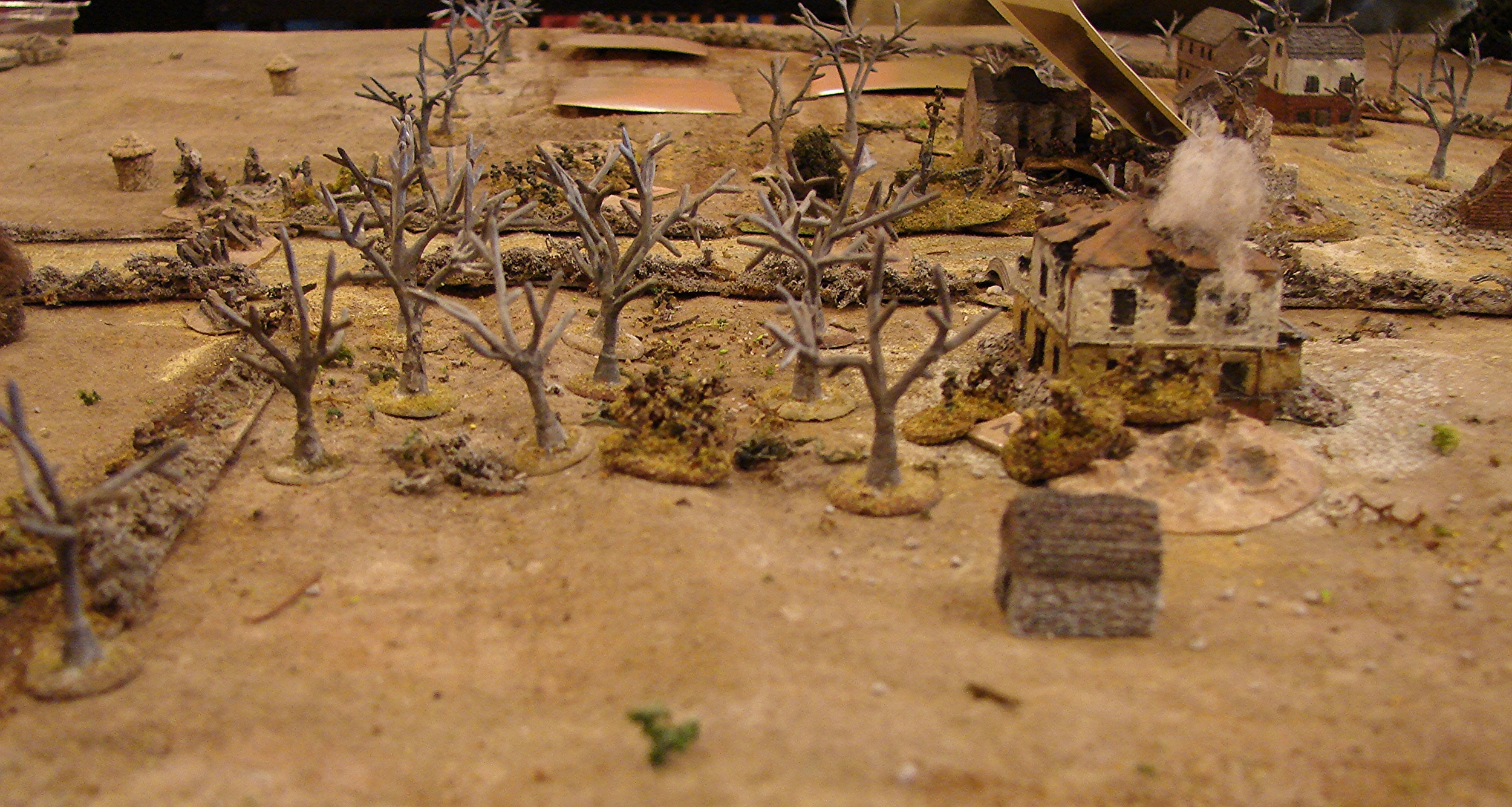 Take the House The 1st Platoon makes a run at the large house. No Germans in there at this point, but they do take some fire from across the road at their left flank. I believe that the first Brit Big Man went down at this point. He would be the first of many.