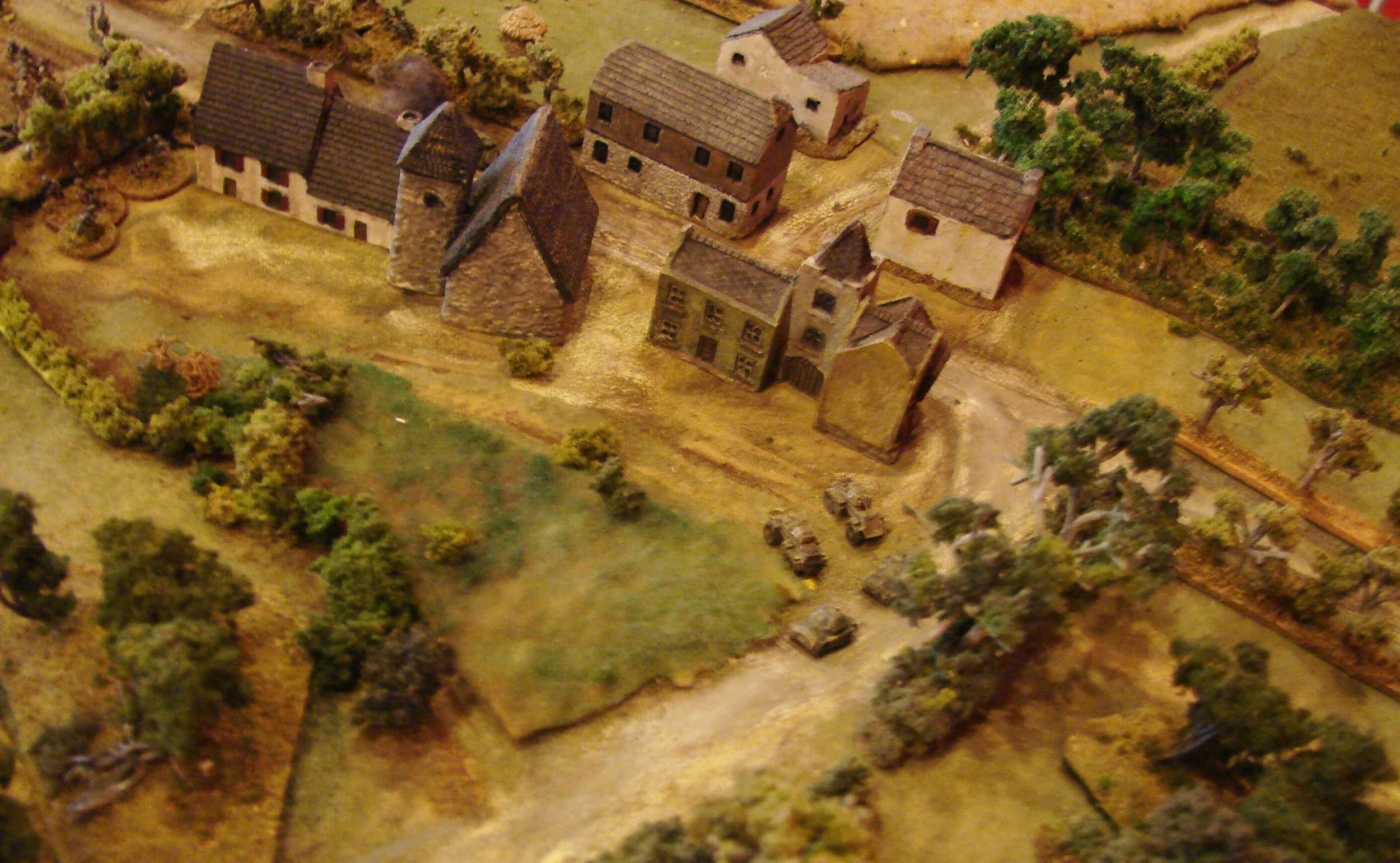 Timing is a bit off This group of Humbers arrives just a bit late to help with the carrier section attack. They could've really chewed up the Grenadiers behind the hedgerow. And been in a good position to intercept the German recce parade that just zipped past.