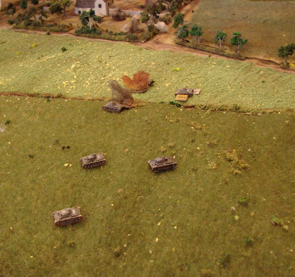 Matildas also score Following the Mk Is were a section of three Matilda Mk IIs which immediately open up on the zug of Pz IIIs and do some amazing damage over the next few turns. Of those three Pz IIIs one is destroyed outright, one abandoned after getting immobilised and the third takes a few hits to the tracks and turret. The Matildas take some mobility hits in return.