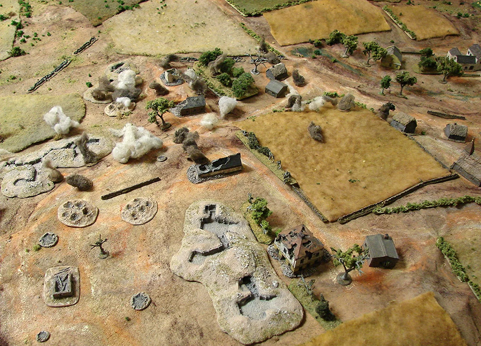 Barrage area Martins's units were part of a Panzer recce battalion, reinforced with a battery of three StuG IIIs. He had a platoon of grenadiers in seven Sdkfz 250s; with one 250/10 with a Pak 36 and three 250/9s with the 20mm autocannon in a turret. The 250/9s were deployed forward overlooking the rolling terrain and the Stugs were this side of the barrage. The grenadiers were in the orchard area inside the barrage area.