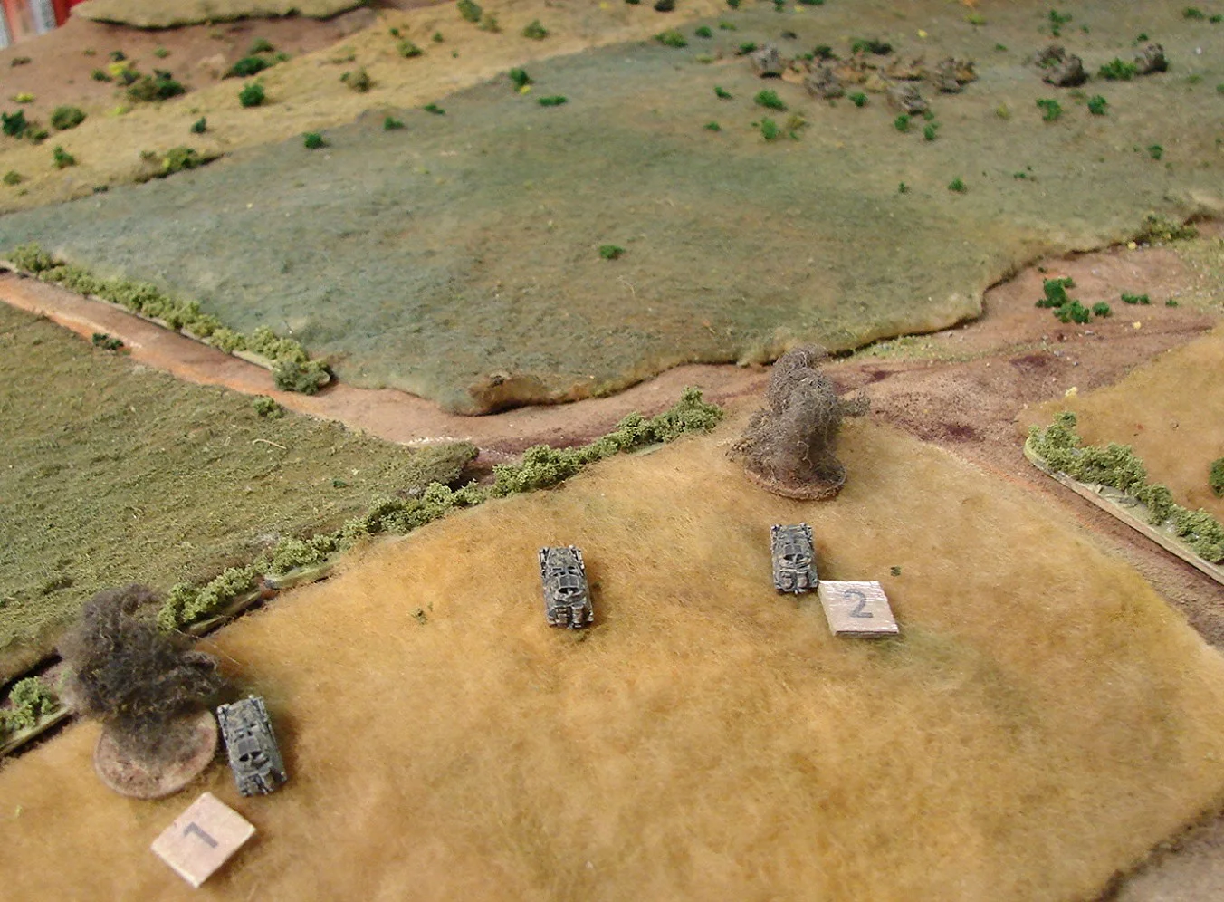 Return fire on the halftracks Martin won't stick around too long in this unequal contest. Even though they were a small hull down target, Rick scored a couple of minor hits
