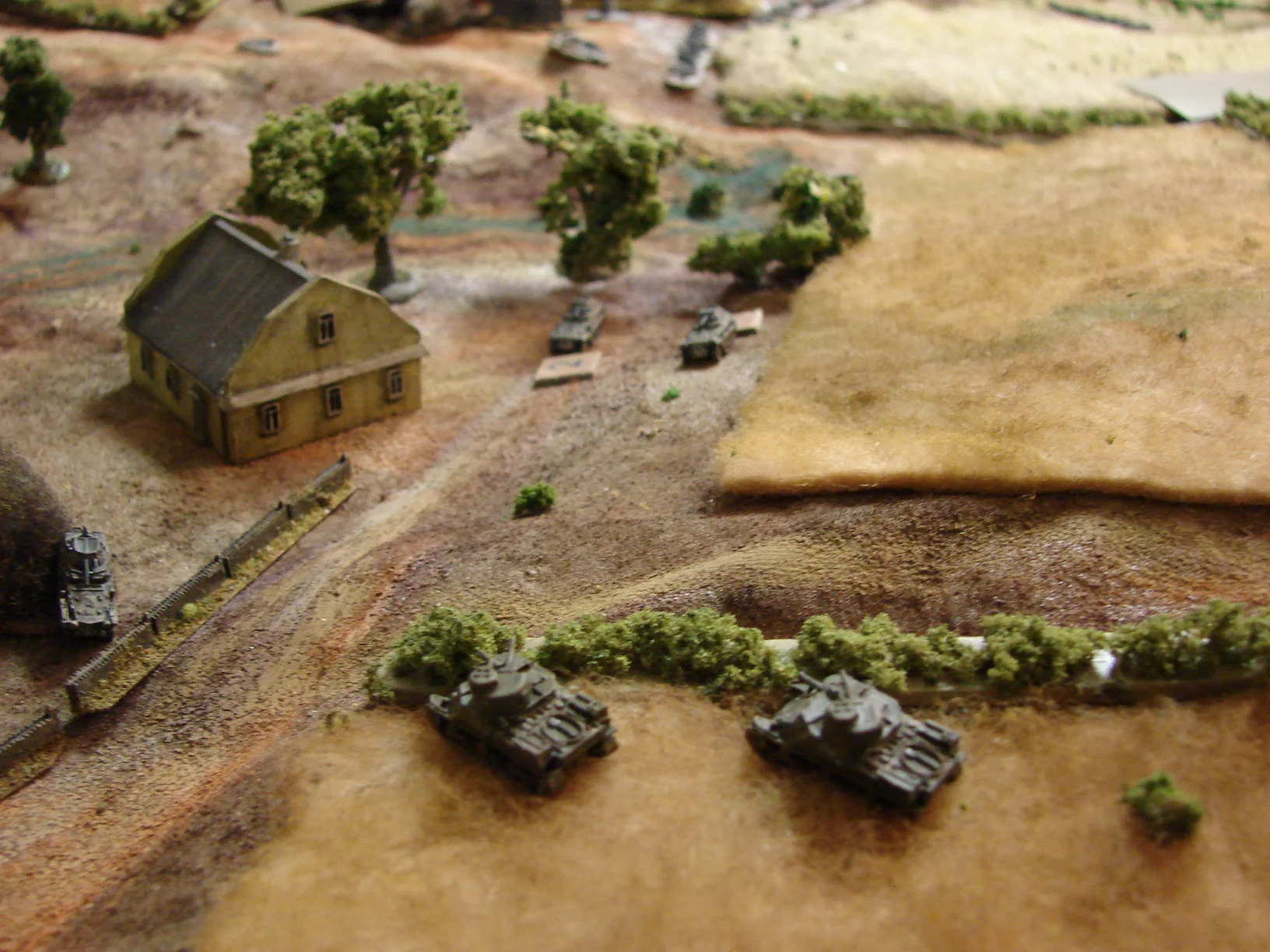 Making sure that the 250/9s are out of action The abandoned halftrack was hit again to make sure that it was truly KO'd.