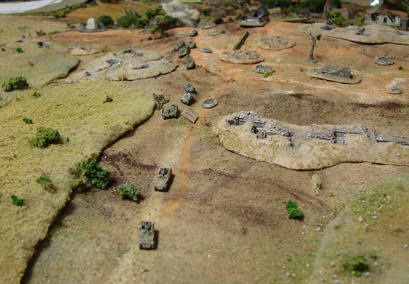 Germans pulling back Martin decided to vacate the premises. Only a weak grenadier platoon, two 250/9s and two StuGs left. Quite a bit of small arms firepower but not a lot of anti-tank, especially since one of the Stugs had a (-1) to hit now.