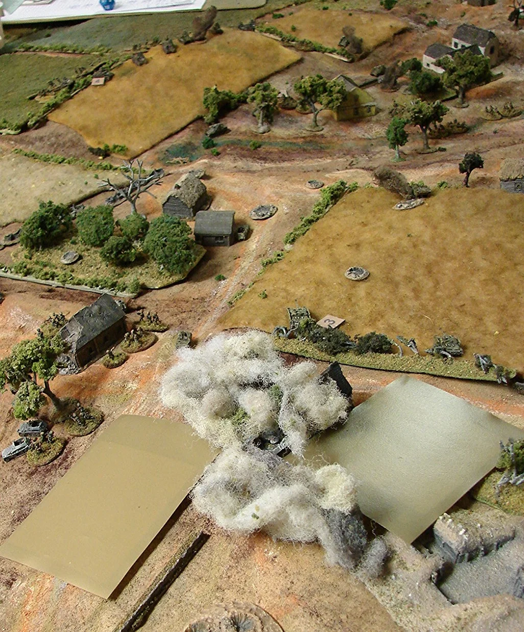 Smoke Rick called in some smoke to mask his advance. It took so long to arrive that it pretty well worked to mask Martin's Germans withdrawing.