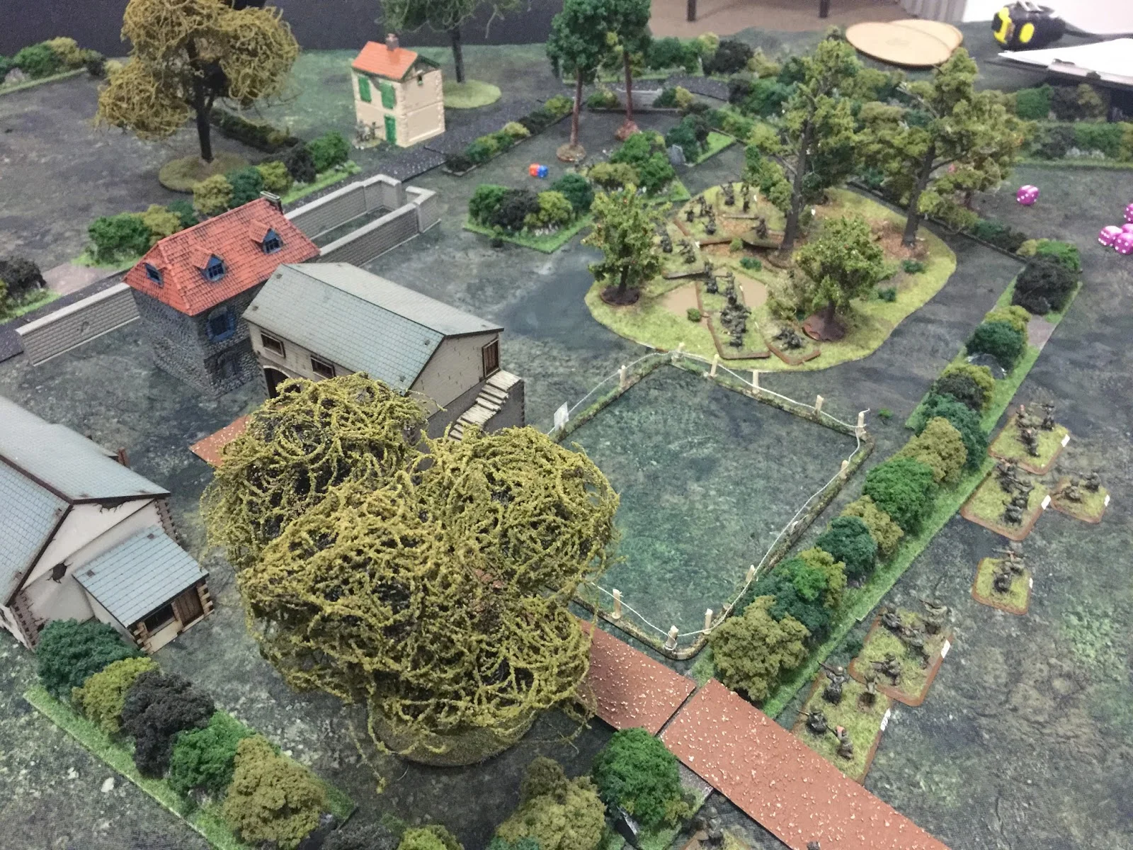 The Americans have the orchard, but the Germans in the whitewashed cottage and the carriage barn do have a pretty good field of fire...