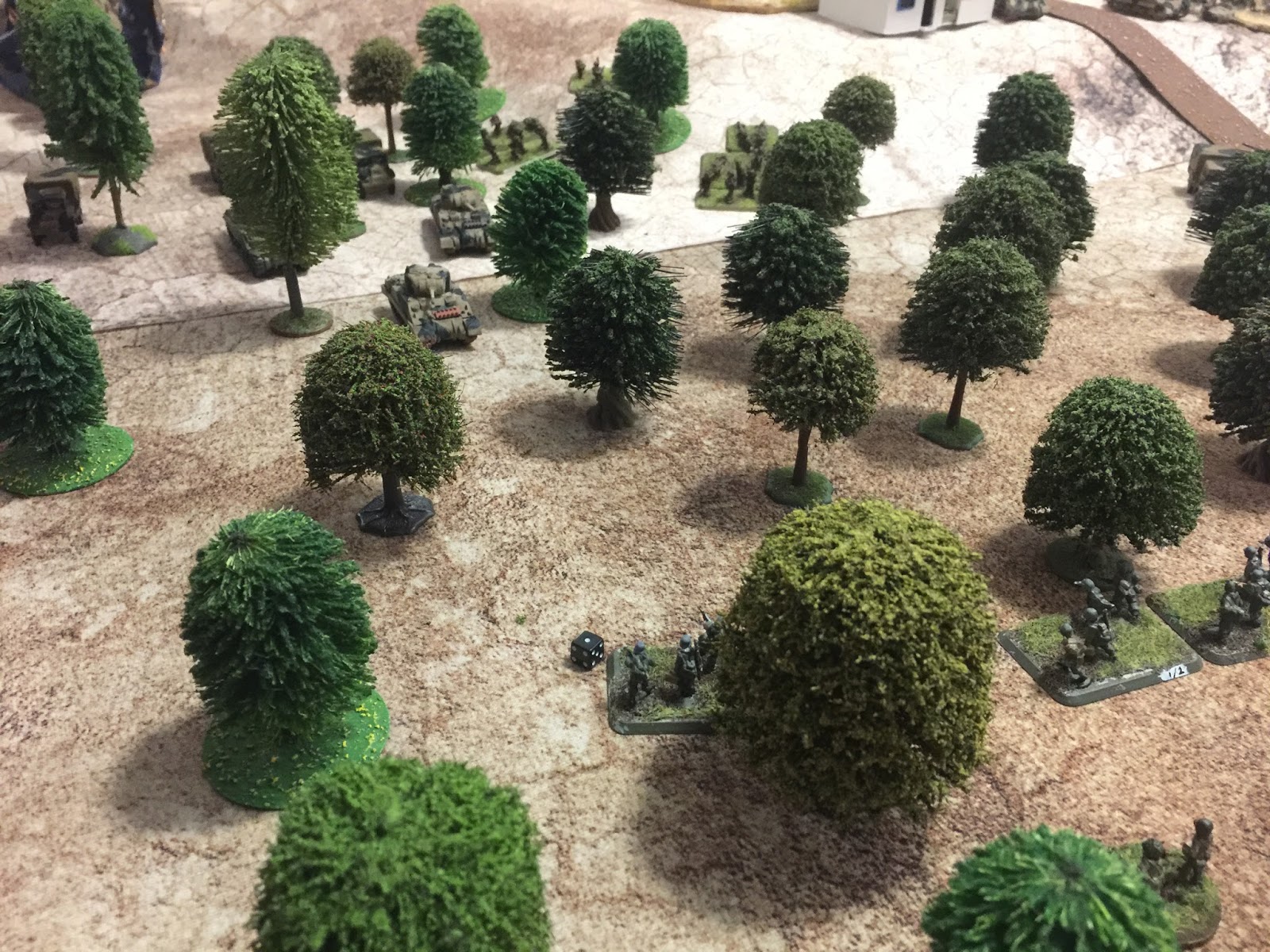  A troop of the 16th/5th Lancers are forcing their way through the olive grove. The German Zug is rather regretting its decision to re-enter the trees. 