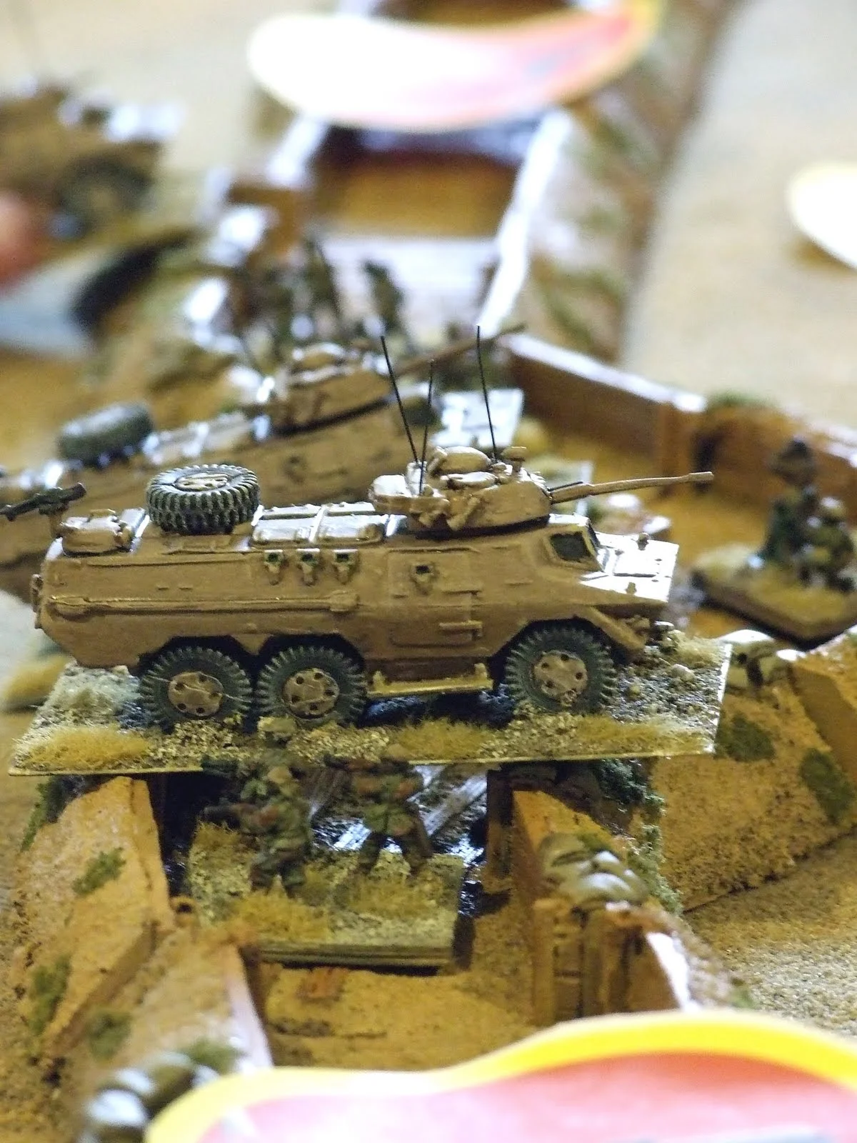 The Ratel-20's storm the trenches. It gets ugly fast. Lesson learned, don't close assault unpinned troops in trenches.