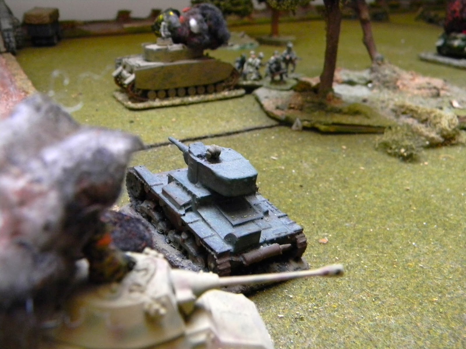 The Soviets have one armoured car left which fires at the infantry on there bridge. To counter this, Warsteiner sends men out to "stalk" the A/C.