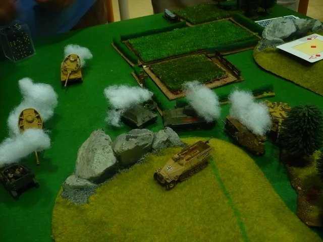 Smoke makes it hard to see who has the advantage in the centre