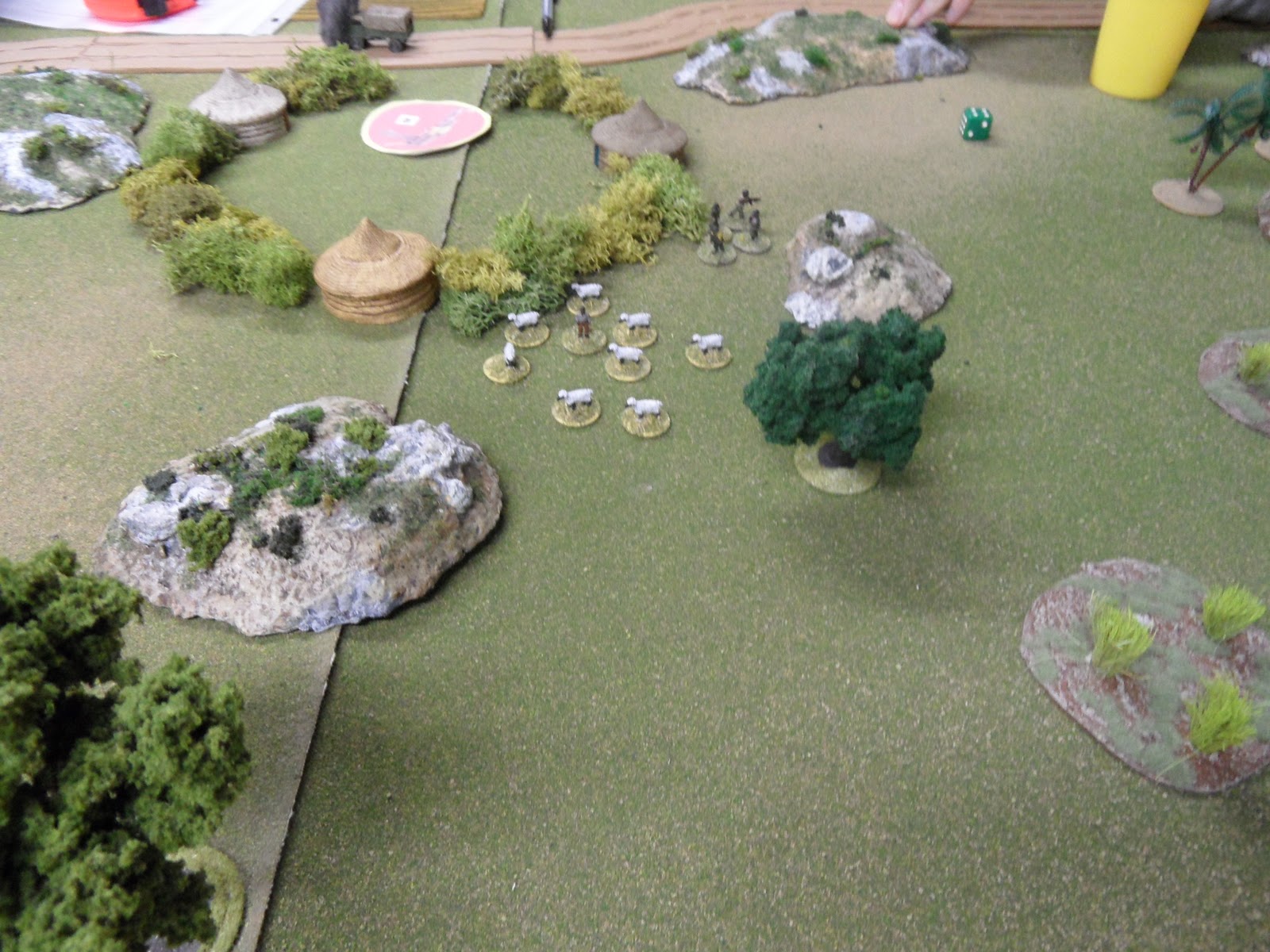 Fearing the retribution of the rapidly advancing R.L.I. the RPG crew fled behind the village  causing the shepherd to try to find a less hazardous area to graze his flock