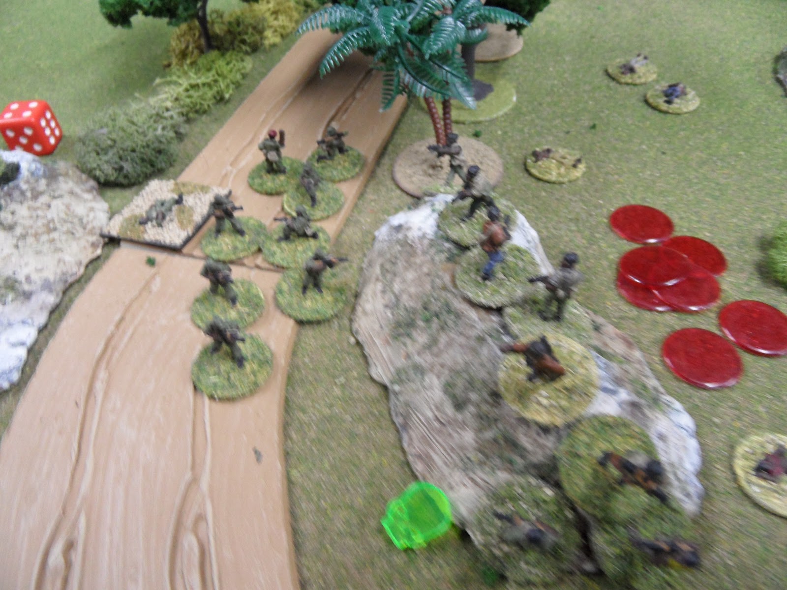  A Government squad (poorly supported by the beaten-down squad on the Hill of Blood) attempts to assault the rebels across the road...    