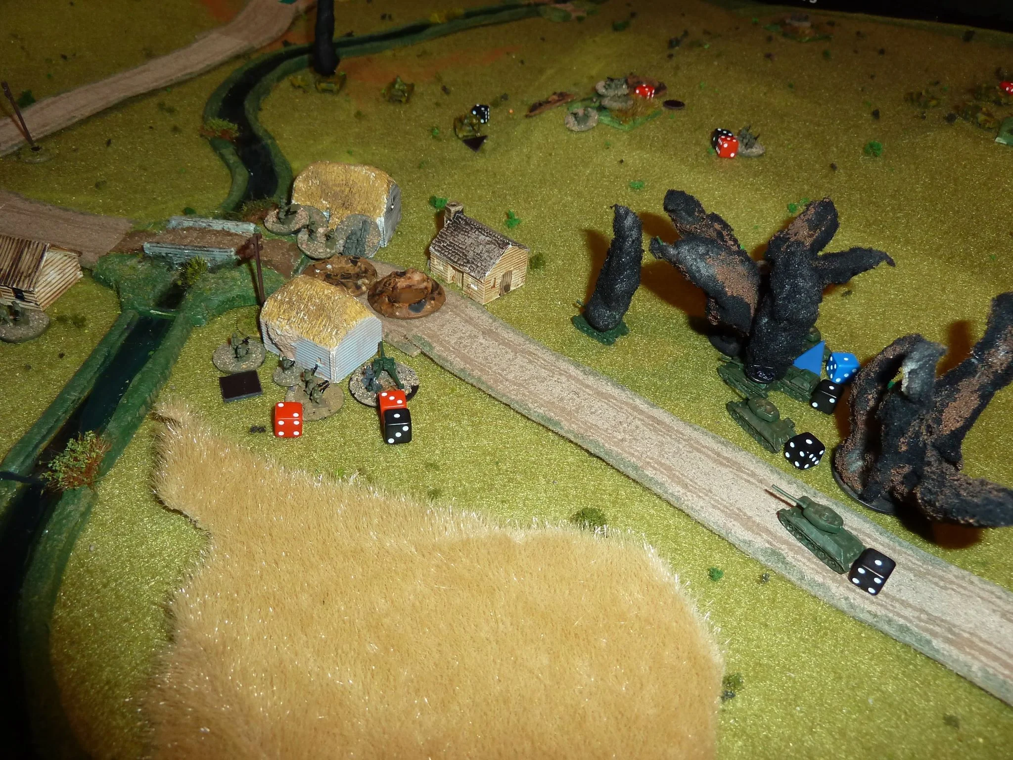 A close-up of the mortar fire landing on the Soviet armour