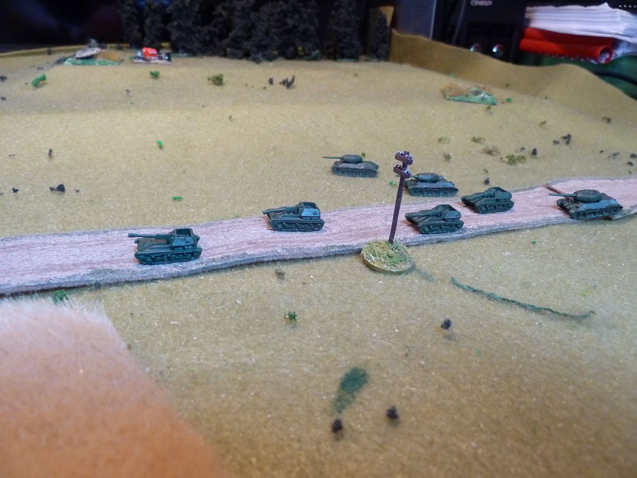 The T-34/85s arrive on the table and dash forward, catching up with the slow moving Su-76s. 