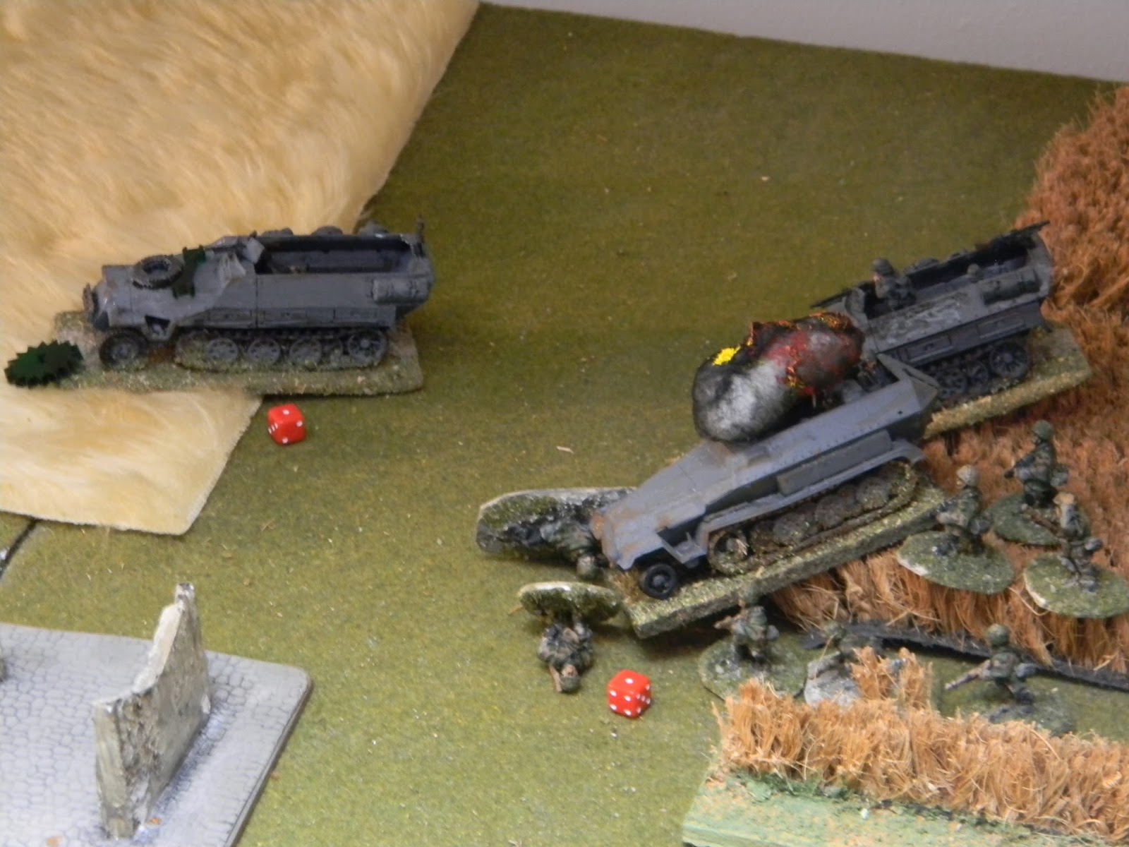  Bang ! &nbsp;One half-track erupts in flames and another has taken damage too. 