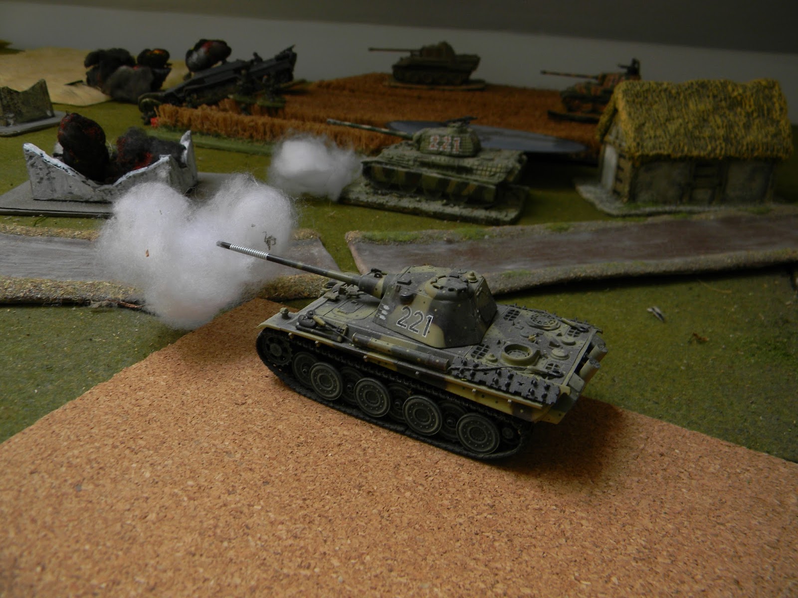 Two Panthers move into town and also aim at the enemy guns 