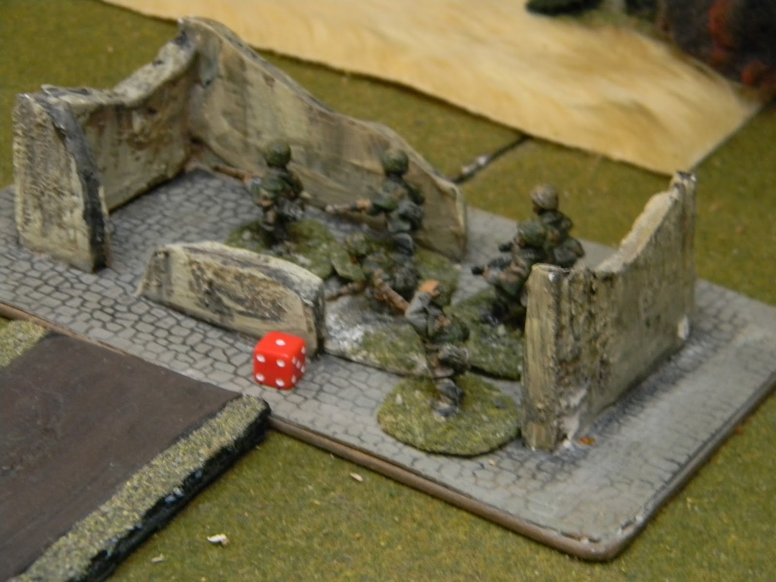  Some of the Panzer Grenadiers have made it into the ruins of the small churc 