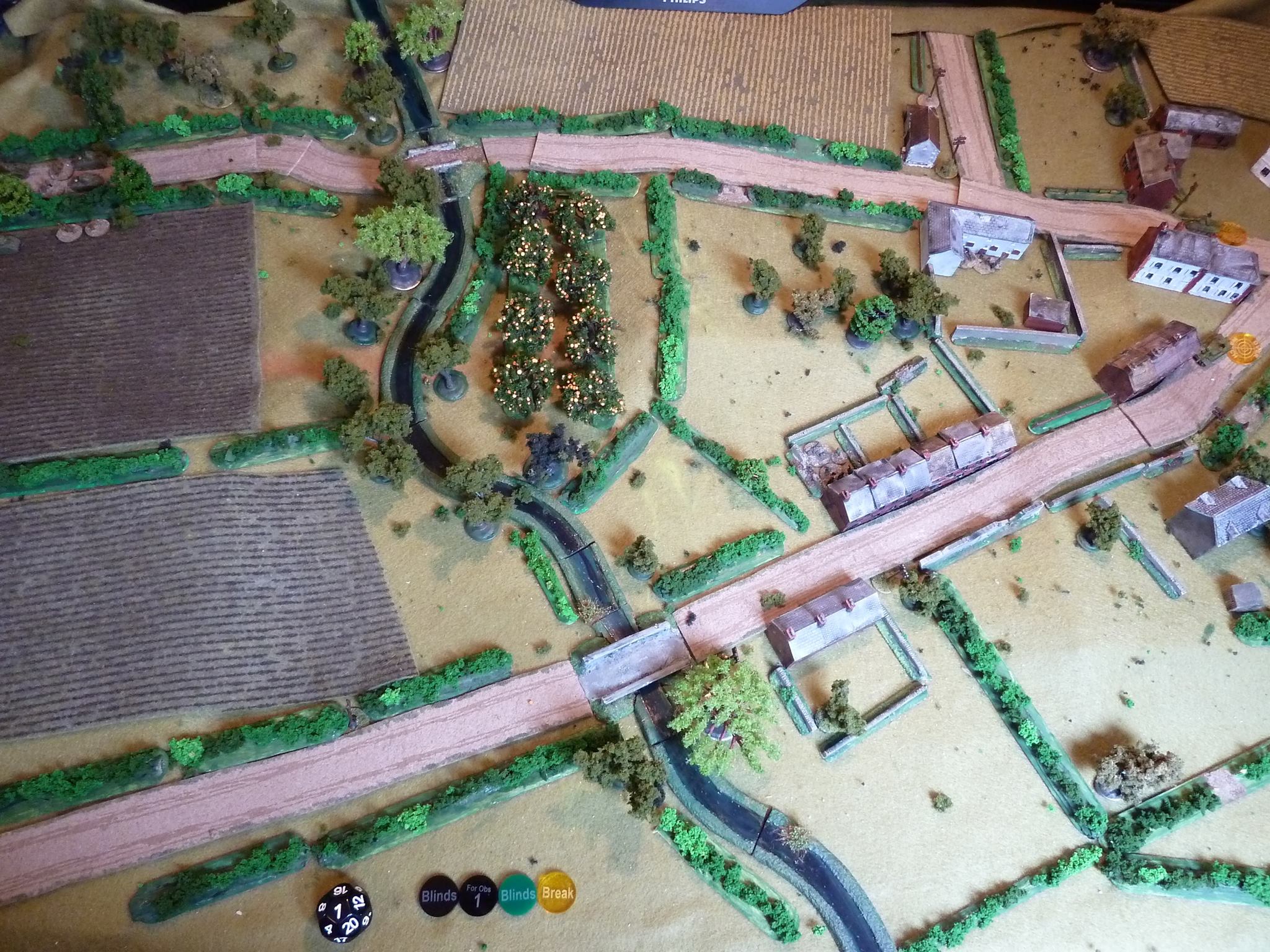  The Canadians enter top left, initially with a platoon of Shermans and infantry.&nbsp;  The plan is to advance a tank/infantry force up either side of the top road through the panted field and orchard to seize the crossroads. 