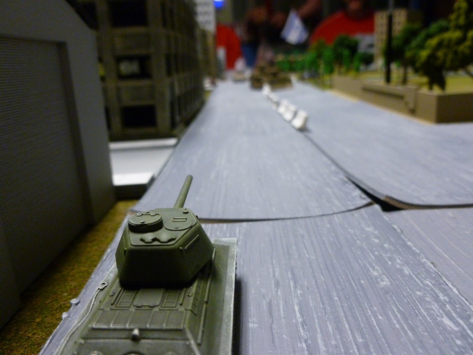  The T-34/85 hit the D9 and caused no damage (of course). The 'dozer calmly went about it's work ignoring the silly old tank and, in moving to the side, exposing the Blind behind it:&nbsp;a Magach!  The antique was in real trouble. 
