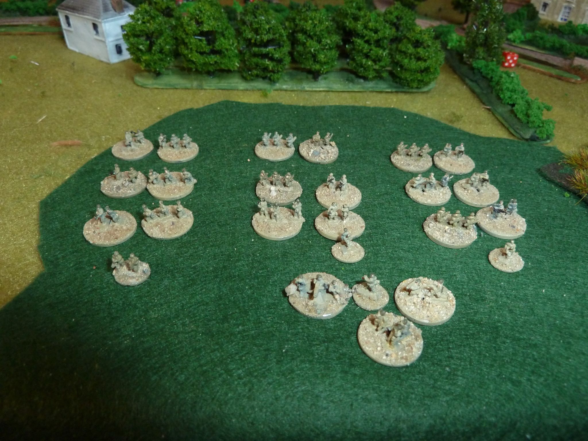 The Attackers: A full strength US Infantry company with an MMG, bazooka and plenty of level II (1 figure) and III (2 figures) leaders plus a Company Commander (level III)