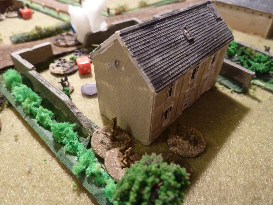  The final assault: two squads from British #3 platoon storm into the rear of the farm house to take out the MMG upstairs and attack the German squad out in the front garden from close range. 