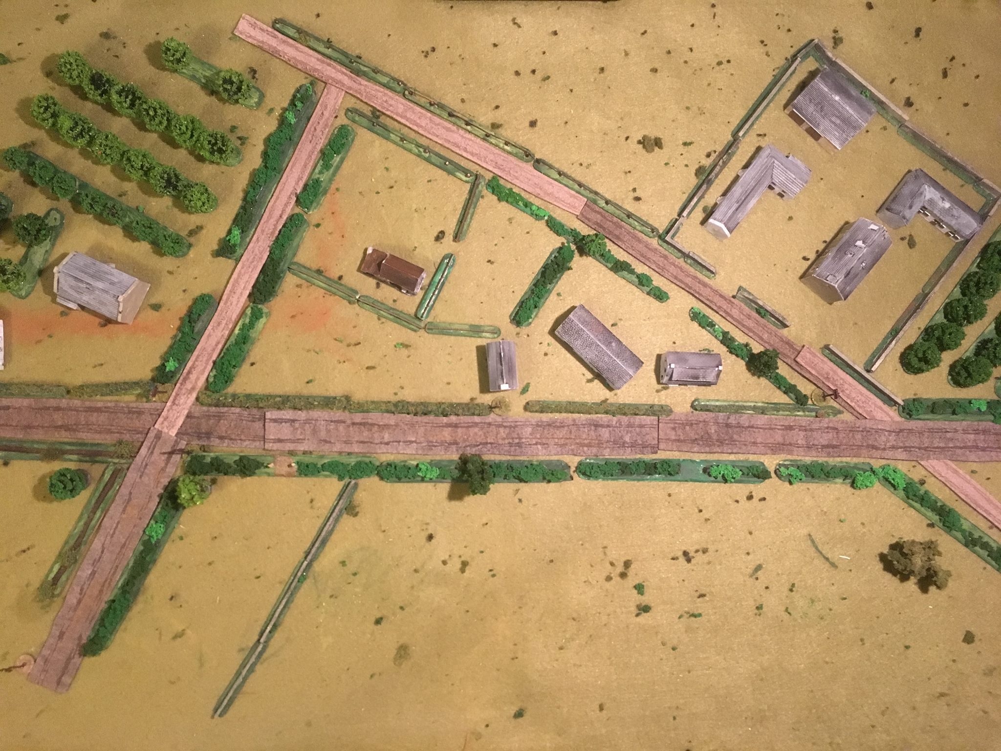  My interpretation of the terrain. The British come in from the orchard on the left and the Germans hold the farm complex and the buildings in the centre. 
