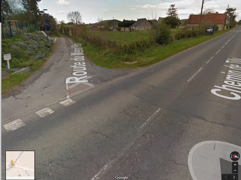  Google street view shot showing the terrain from the junction of the main road and the track near the British entry points. Note small hedges (soft cover) and generally flat terrain.